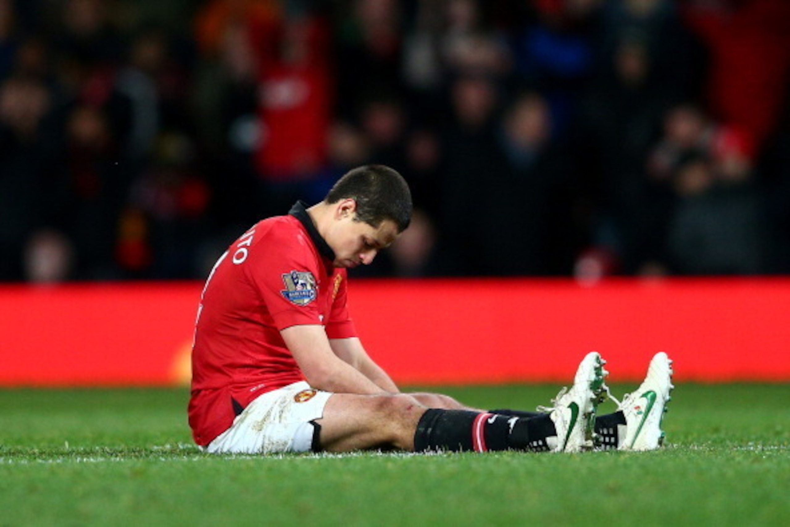 MANCHESTER, ENGLAND - JANUARY 22:  A dejected Javier Hernandez of manchhester United reacts after a missed chance on goal during the Capital One Cup semi final, second leg match between Manchester United and Sunderland at Old Trafford on January 22, 2014 