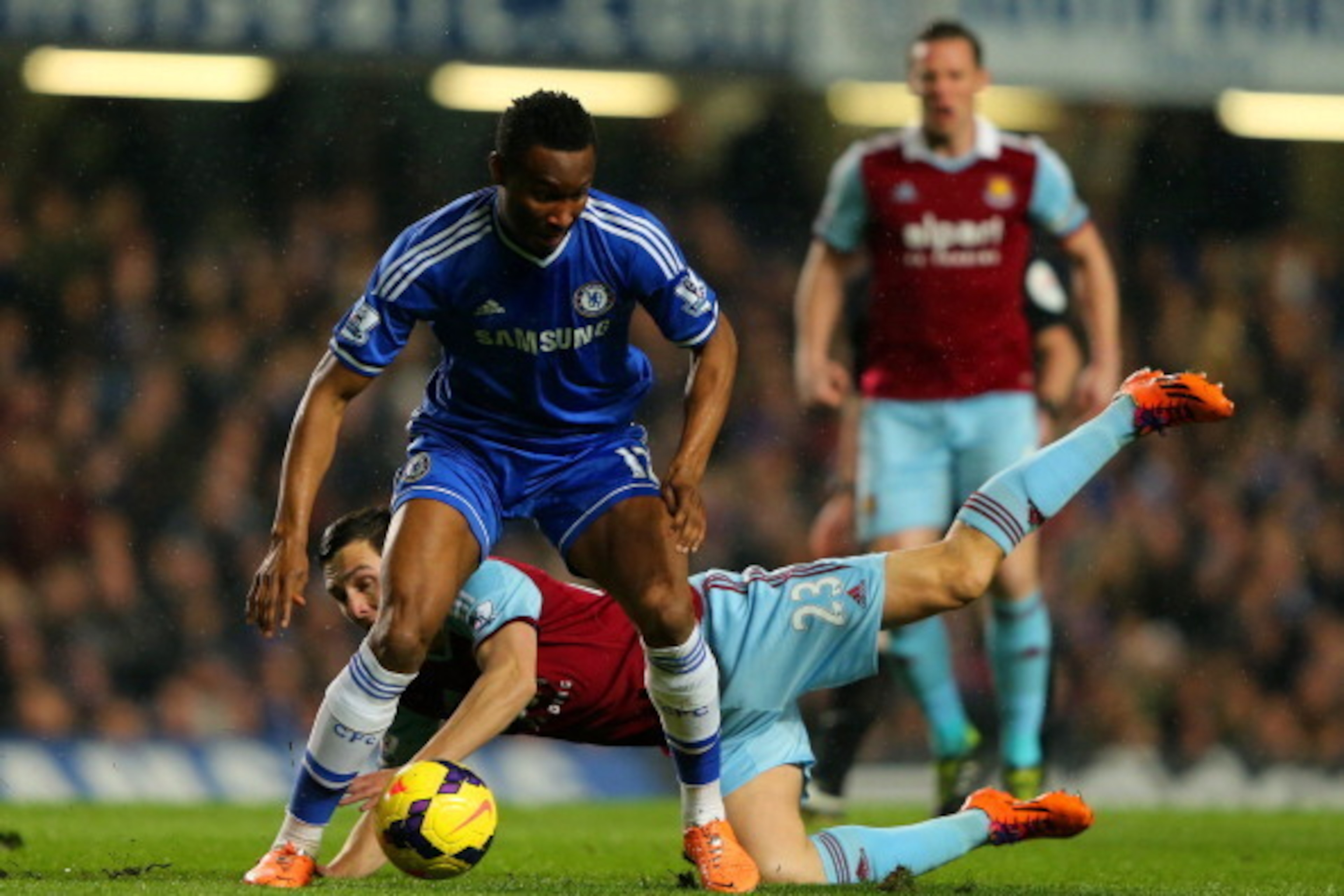 LONDON, ENGLAND - JANUARY 29: Stewart Downing of West Ham clashes with John Obi Mikel of Chelsea during the Barclays Premier League match between Chelsea and West Ham United at Stamford Bridge on January 29, 2014 in London, England. (Photo by Ian Walton/ LONDON, ENGLAND - JANUARY 29: Stewart Downing of West Ham clashes with John Obi Mikel of Chelsea during the Barclays Premier League match between Chelsea and West Ham United at Stamford Bridge on January 29, 2014 in London, England. (Photo by Ian Walton/