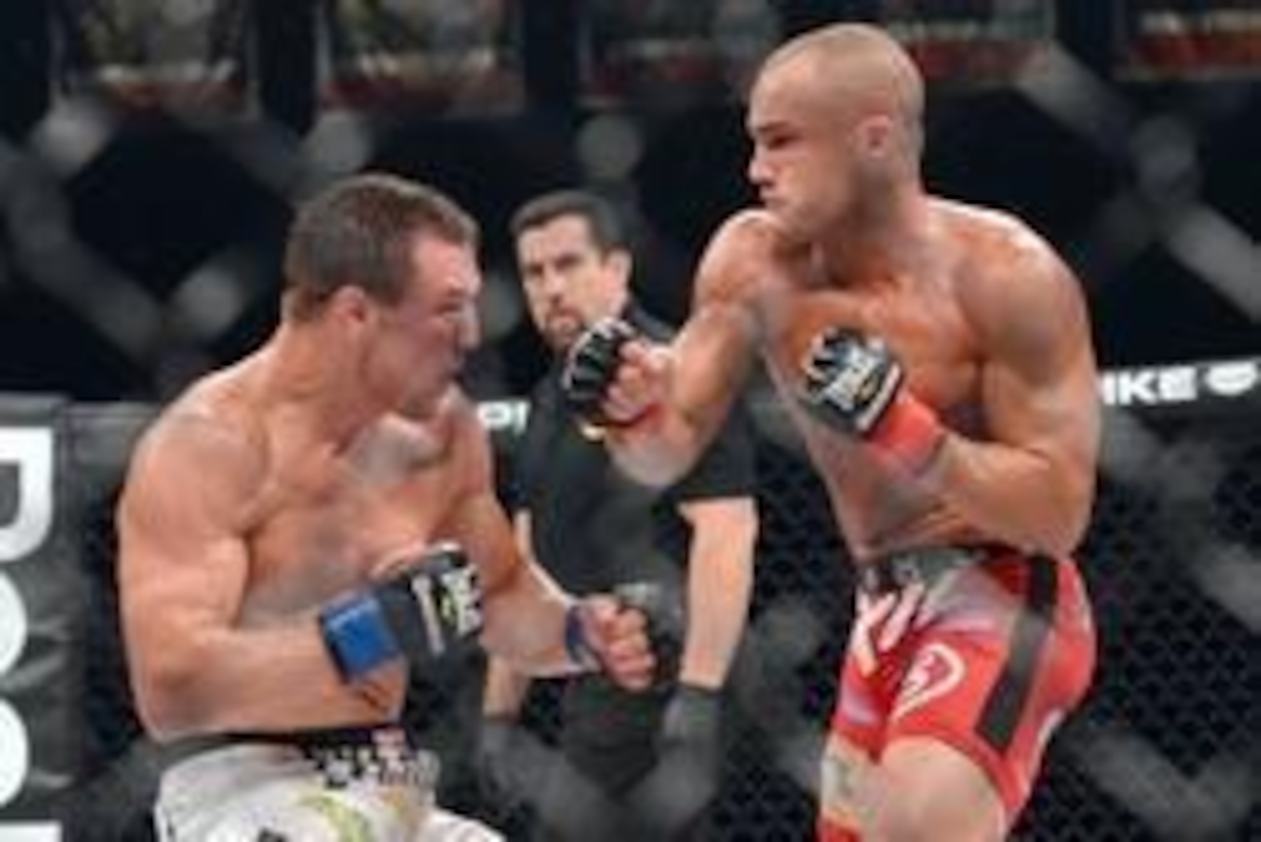 Nov 2, 2013; Long Beach, CA, USA;   Eddie Alvarez (red gloves) and Michael Chandler (blue gloves) during their Bellator lightweight world championship fight at the Long Beach Arena. Alvarez won the fight. Mandatory Credit: Jayne Kamin-Oncea-USA TODAY Spor