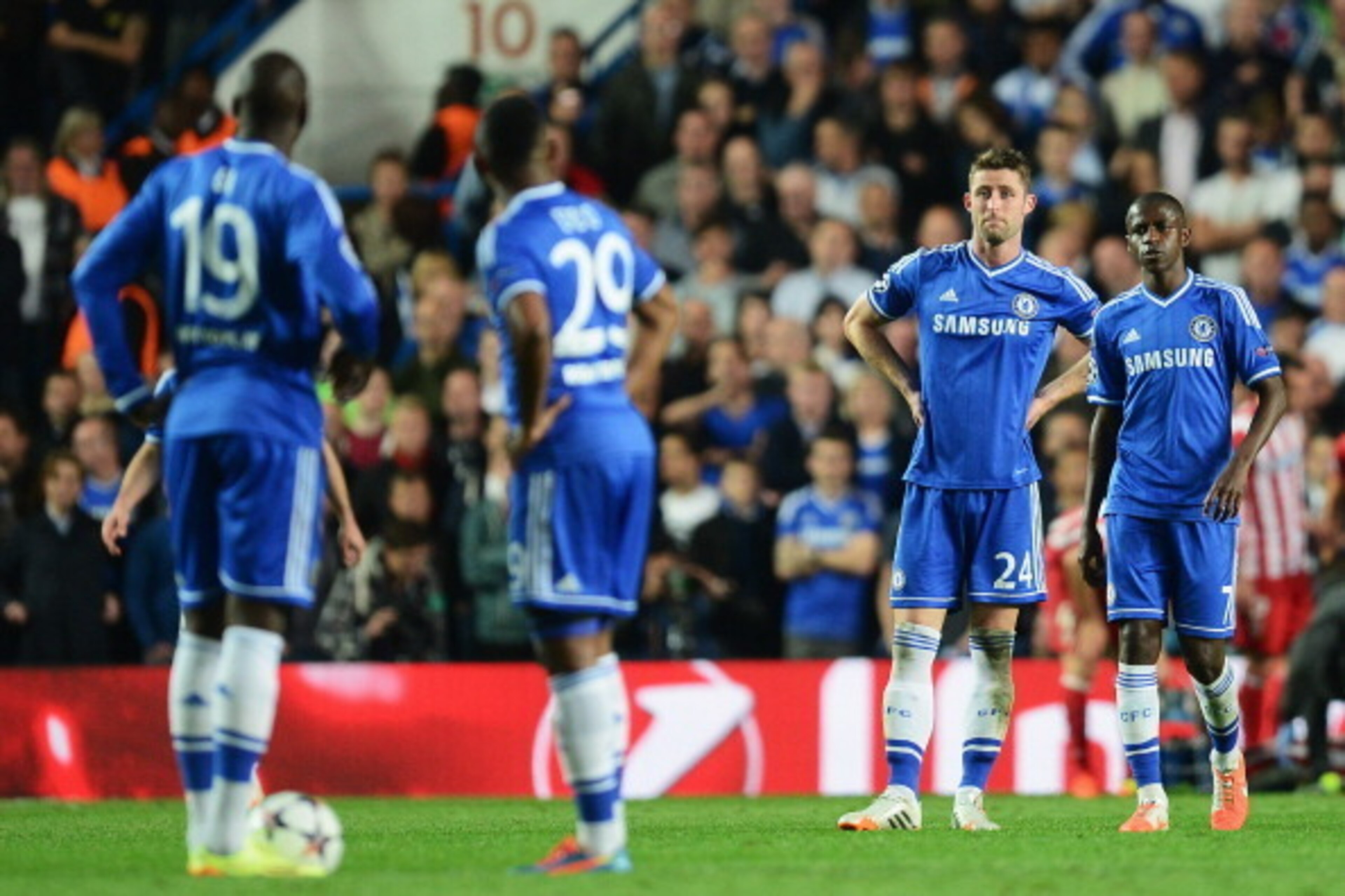 LONDON, ENGLAND - APRIL 30: Gary Cahill (2ndR) and Ramires (R) of Chelsea look dejected during the UEFA Champions League semi-final second leg match between Chelsea and Club Atletico de Madrid at Stamford Bridge on April 30, 2014 in London, England.  (Pho