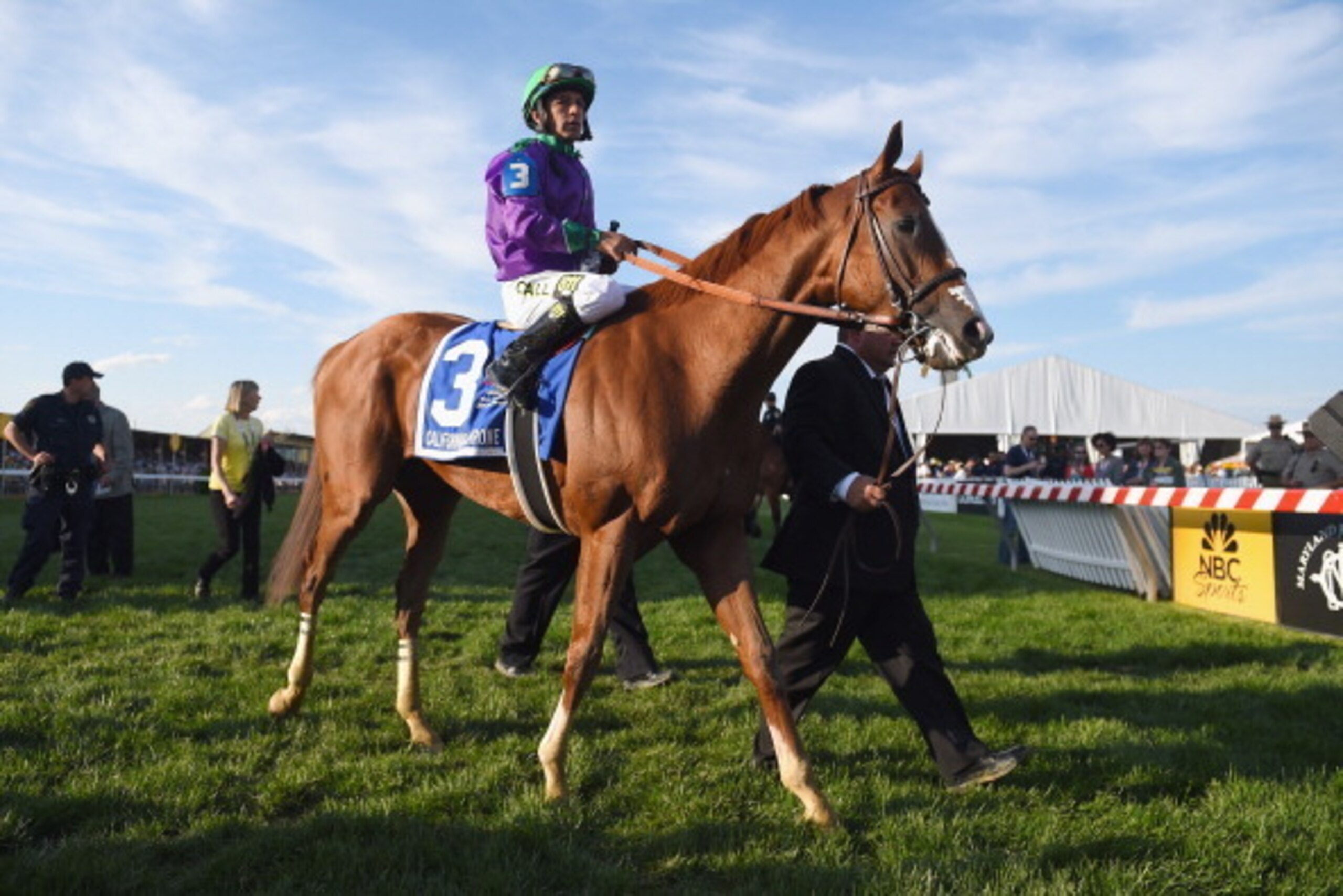 BALTIMORE, MD - MAY 17:  Victor Espinoza rides atop California Chrome #3 during the post parade for the 139th running of the Preakness Stakes at Pimlico Race Course on May 17, 2014 in Baltimore, Maryland.  (Photo by Patrick Smith/Getty Images)