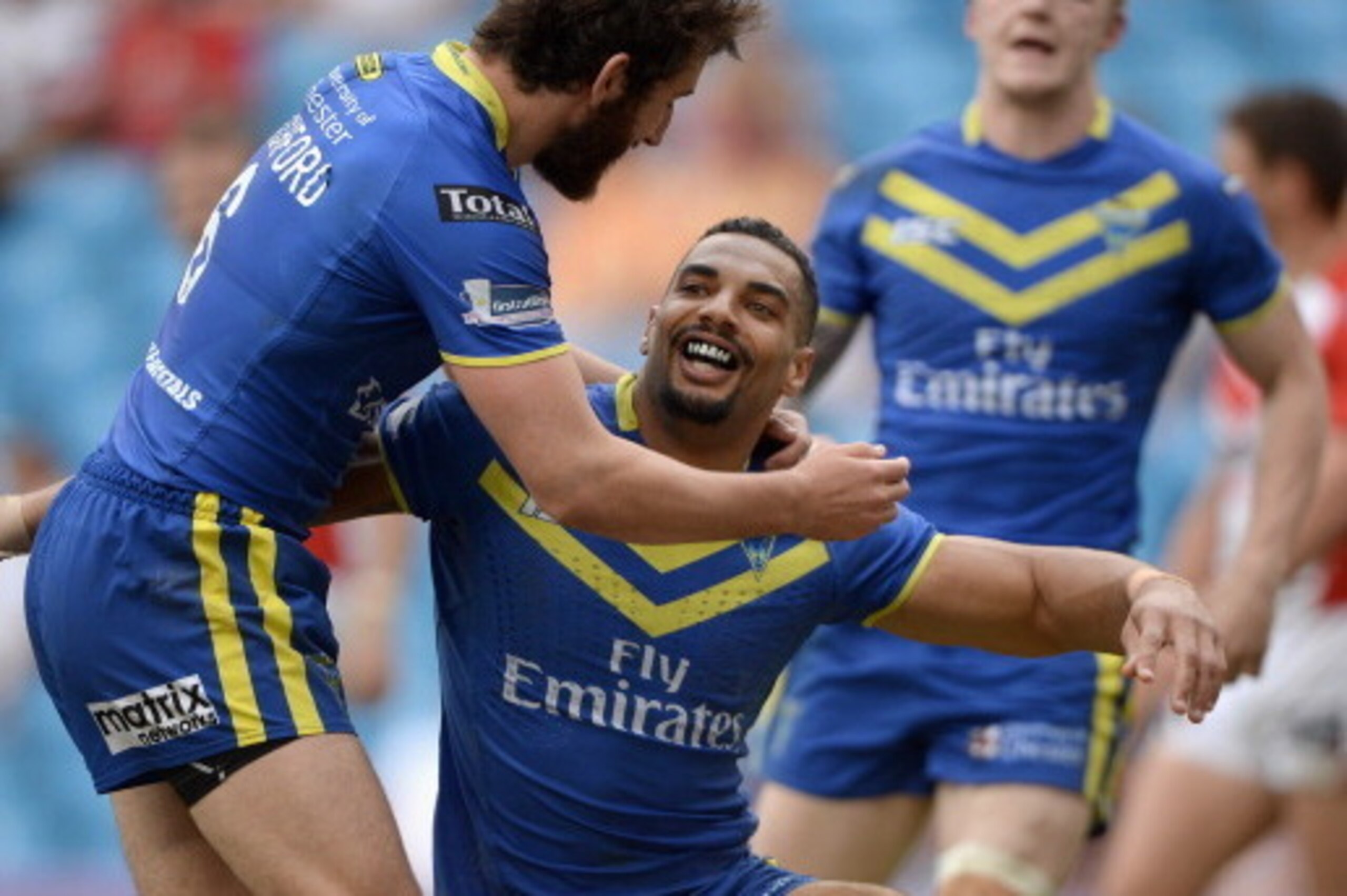 MANCHESTER, ENGLAND - MAY 18: Ryan Atkins of Warrington Wolves celebrates scoring his team's 5th try during the Super League match between Warrington Wolves and St Helens at Etihad Stadium on May 18, 2014 in Manchester, England. (Photo by Gareth Copley/ MANCHESTER, ENGLAND - MAY 18: Ryan Atkins of Warrington Wolves celebrates scoring his team's 5th try during the Super League match between Warrington Wolves and St Helens at Etihad Stadium on May 18, 2014 in Manchester, England. (Photo by Gareth Copley/