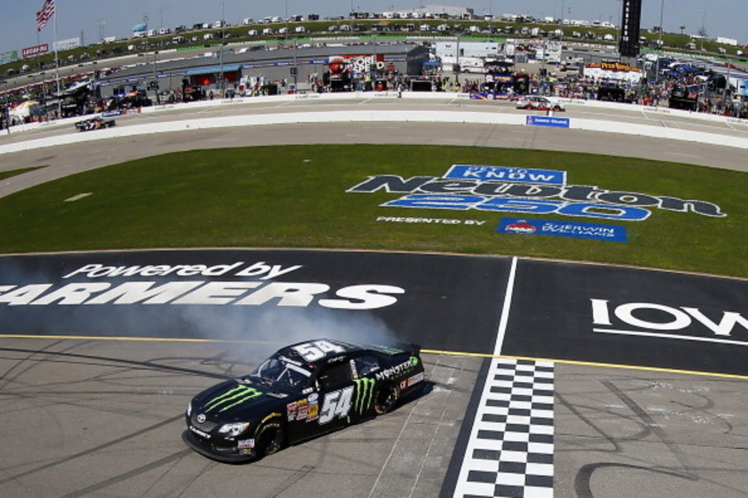 NEWTON, IA - MAY 18: Sam Hornish Jr., driver of the #54 Monster Energy Toyota, does a burnout on the start/finish line after winning the NASCAR Nationwide Series Get To Know Newton 250 Presented By Sherwin Williams at Iowa Speedway on May 18, 2014 in New NEWTON, IA - MAY 18: Sam Hornish Jr., driver of the #54 Monster Energy Toyota, does a burnout on the start/finish line after winning the NASCAR Nationwide Series Get To Know Newton 250 Presented By Sherwin Williams at Iowa Speedway on May 18, 2014 in New