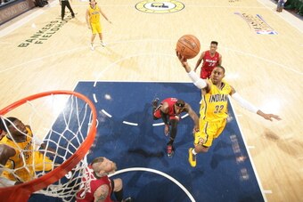 INDIANAPOLIS - MAY 18: C.J. Watson #32 of the Indiana Pacers goes up for the layup against the Miami Heat in game one of the East Conference Finals at Bankers Life Fieldhouse on May 18, 2014 in Indianapolis, Indiana.  NOTE TO USER: User expressly acknowle