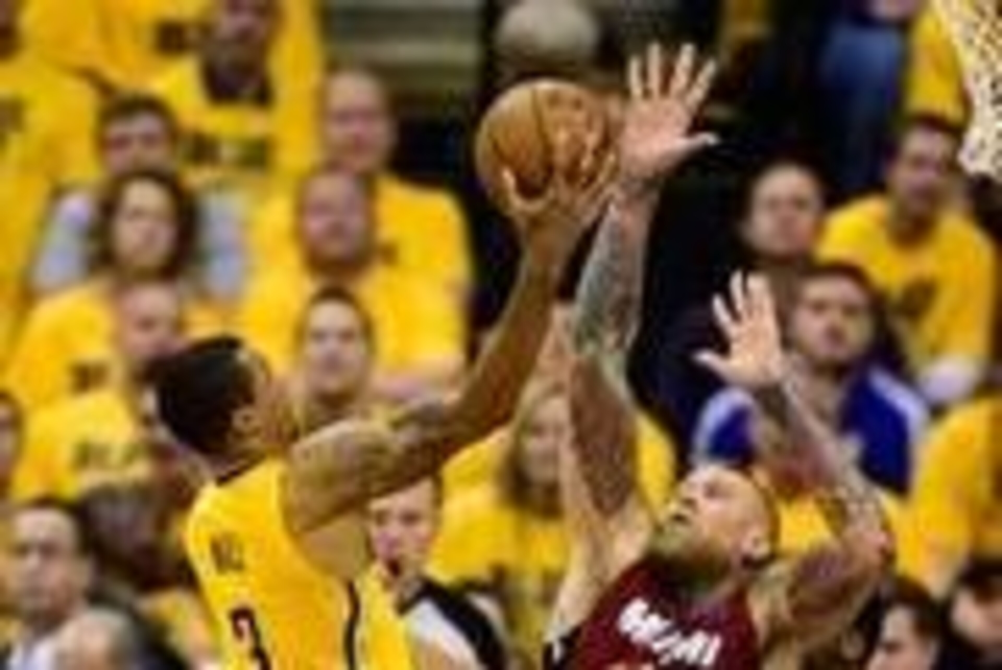 May 18, 2014; Indianapolis, IN, USA;Miami Heat forward Chris Andersen (11) jumps to block a shot by Indiana Pacers guard George Hill (3) during the second half of game one of the Eastern Conference Finals of the 2014 NBA Playoffs at Bankers Life Fieldhous