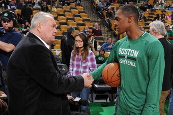 BOSTON, MA - APRIL 4: Rajon Rondo #9 of the Boston Celtics talks with legend Tommy Heinsohn before the game against the Philadelphia 76ers on April 4, 2014 at the TD Garden in Boston, Massachusetts.  NOTE TO USER: User expressly acknowledges and agrees th