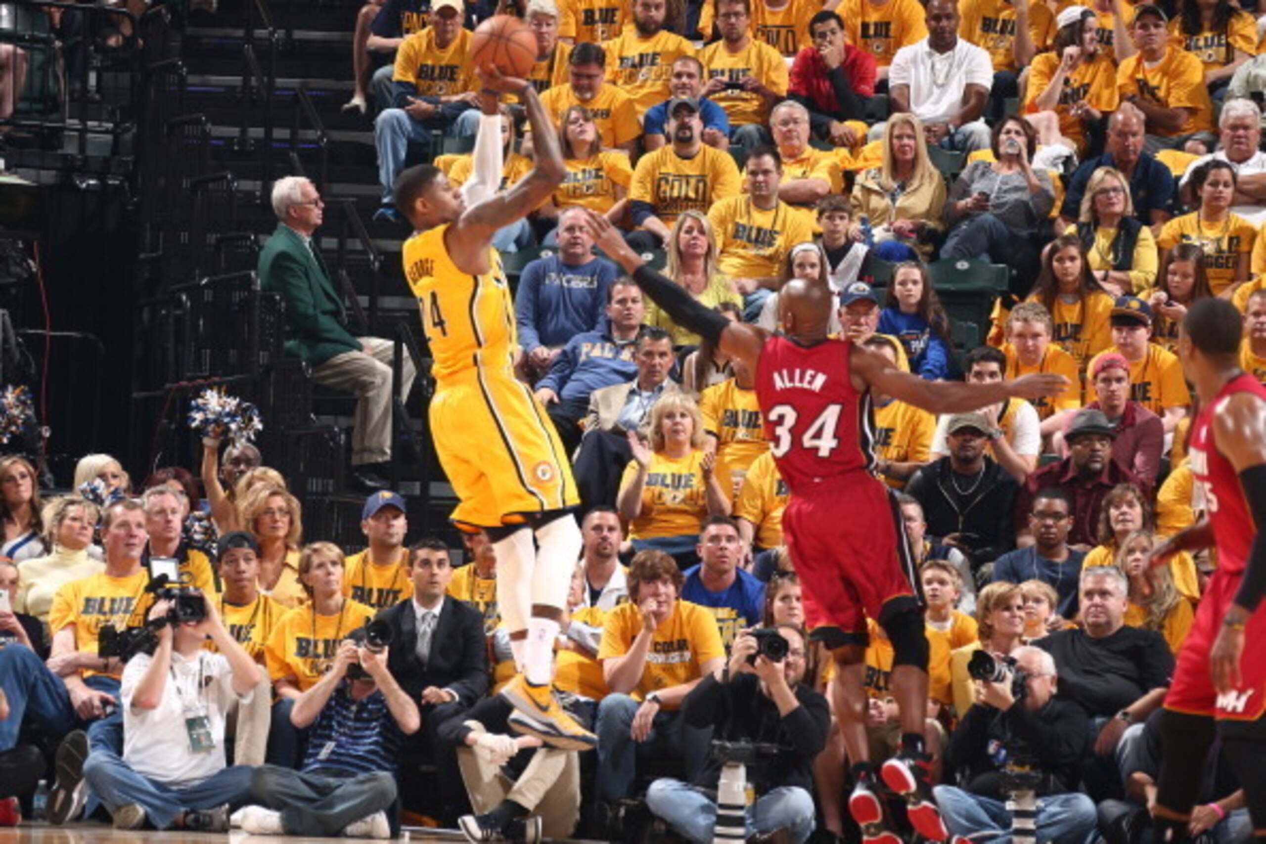 INDIANAPOLIS - MAY 18: Paul George #24 of the Indiana Pacers shoots the ball against Ray Allen #34 of the Miami Heat in game one of the East Conference Finals at Bankers Life Fieldhouse on May 18, 2014 in Indianapolis, Indiana.  NOTE TO USER: User express