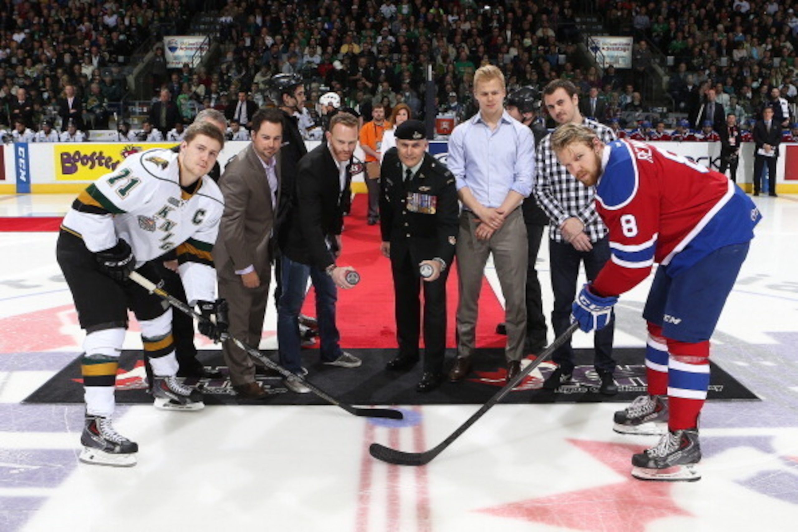 LONDON, ON - MAY 18:  Ceremonial faceoff including ex London Knight stars Olli Maatta and David Bolland prior to play between the London Knights and the Edmonton Oil Kings in Game Three of the 2014 Mastercard Memorial Cup at Budweiser Gardens on May 18, 2