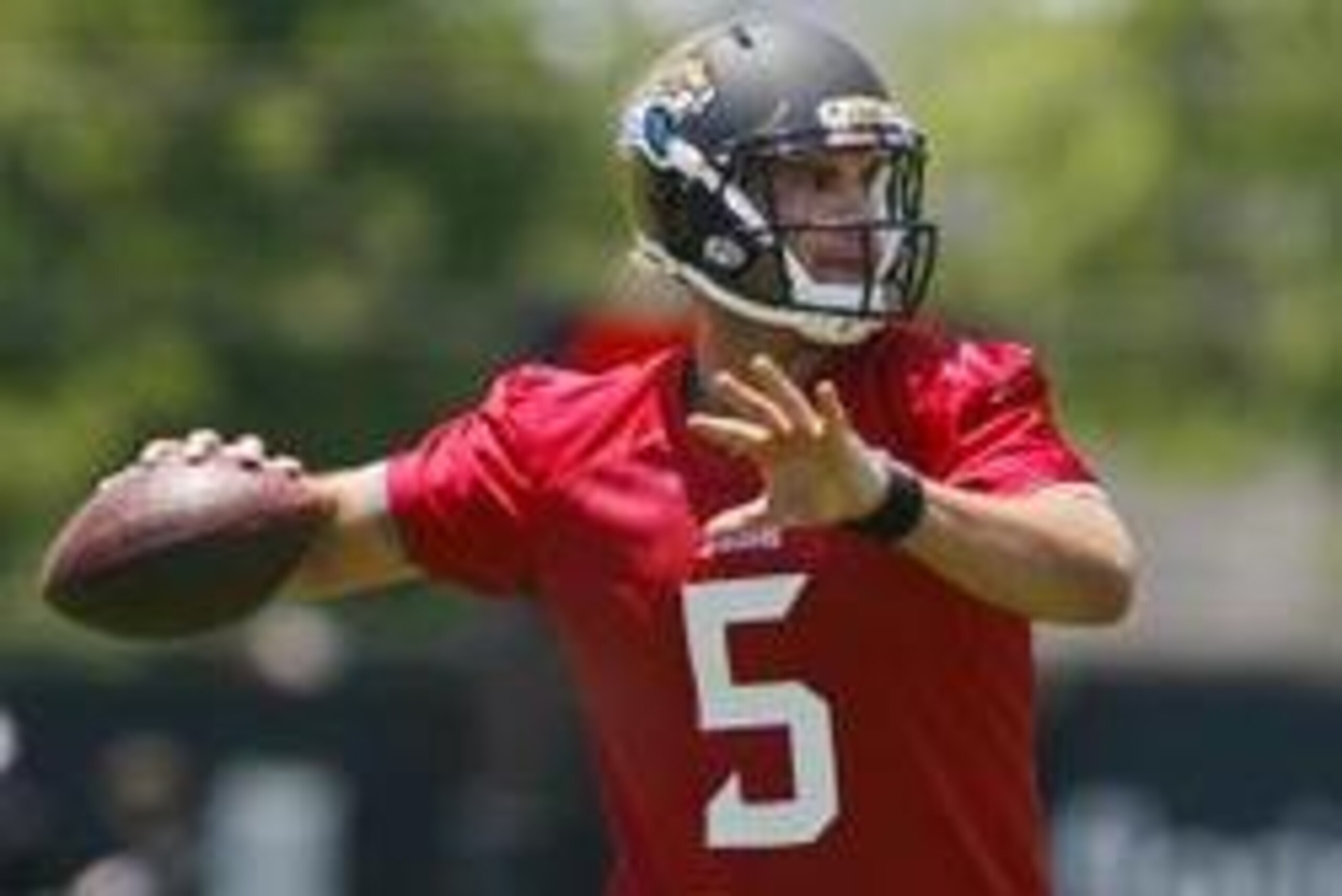 May 16, 2014; Jacksonville, FL, USA; Jacksonville Jaguars quarterback Blake Bortles (5) throws during rookie minicamp at Florida Blue Health and Wellness Practice Fields. Mandatory Credit: Phil Sears-USA TODAY Sports