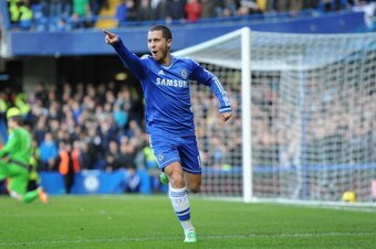 LONDON, ENGLAND - FEBRUARY 08:  Eden Hazard of Chelsea celebrates after scoring his first goal during the Barclays Premier League match between Chelsea and Newcastle United at Stamford Bridge on February 8, 2014 in London, England.  (Photo by Mike Hewitt/