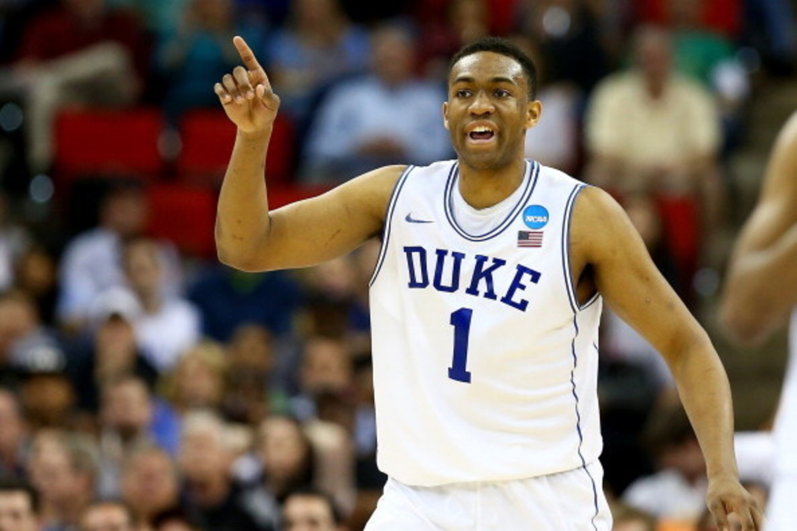 RALEIGH, NC - MARCH 21:  Jabari Parker #1 of the Duke Blue Devils reacts in the second half against the Mercer Bears in the second round of the 2014 NCAA Men's Basketball Tournament at PNC Arena on March 21, 2014 in Raleigh, North Carolina.  (Photo by Str