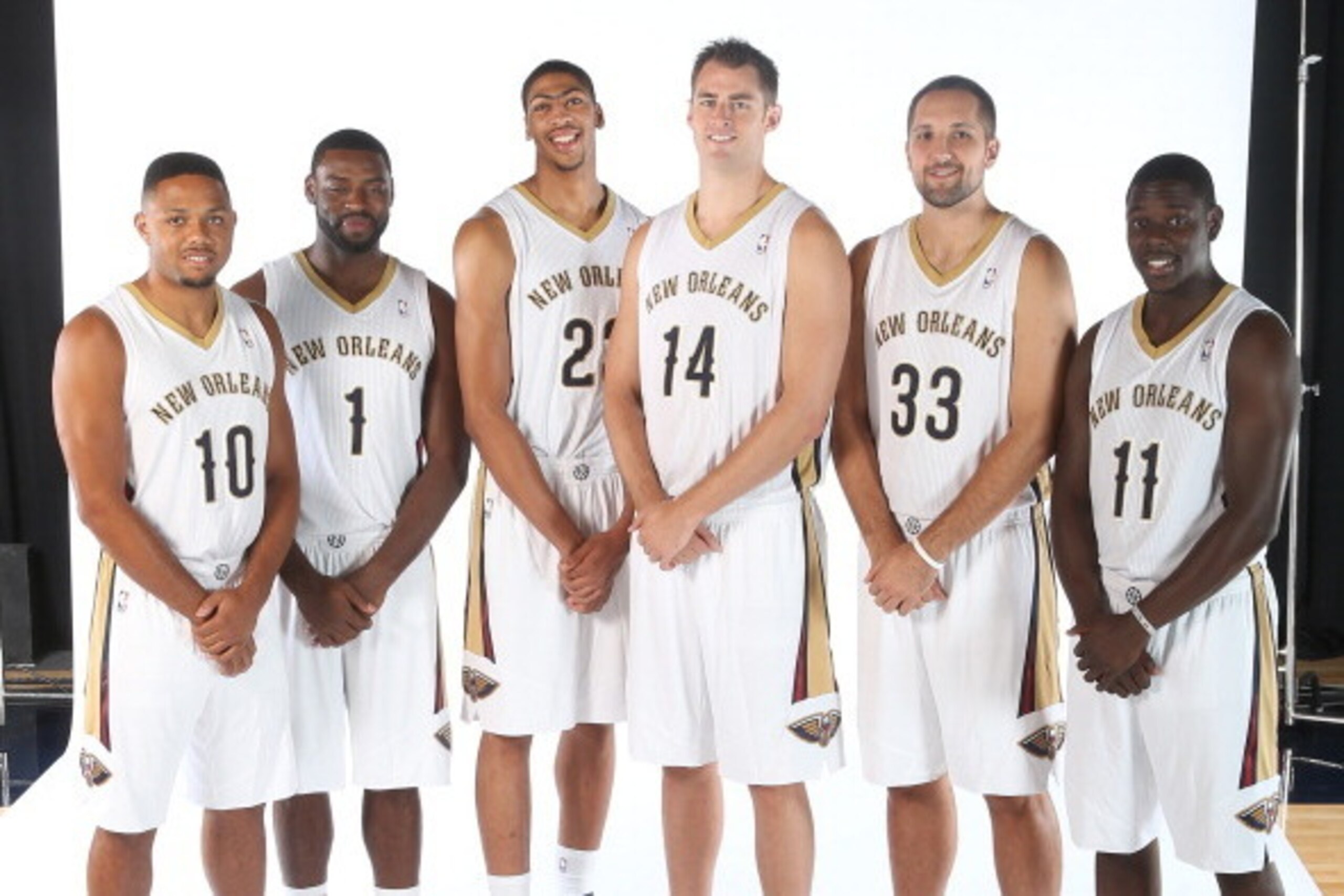 METAIRIE, LA - SEPTEMBER 30: Eric Gordon #10, Tyreke Evans #1, Anthony Davis #23, Jason Smith #14, Ryan Anderson #33 and Jrue Holiday #11 of The New Orleans Pelicans pose for photos during NBA Media Day on September 30, 2013 at the New Orleans Pelicans pr