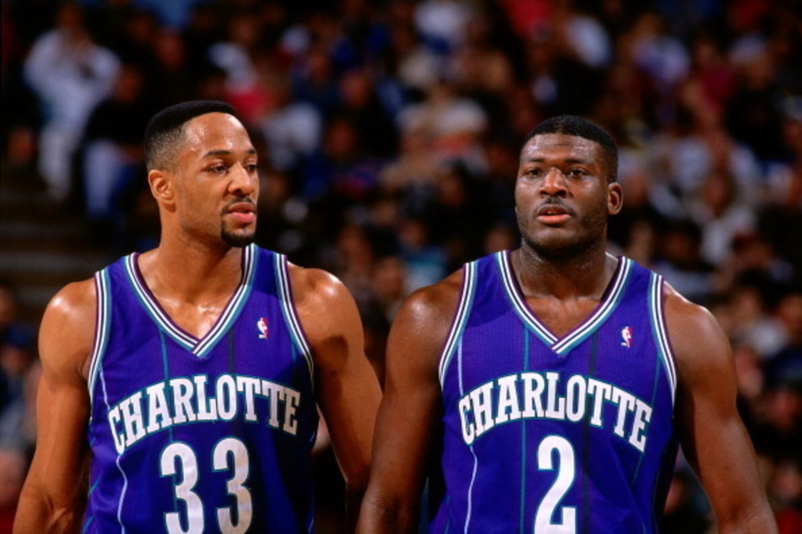 SACRAMENTO, CA - MARCH 5: Alonzo Mourning #33 and Larry Johnson #2 of the Charlotte Hornets walk against the Sacramento Kings during a game played on March 5, 1995 at Arco Arena in Sacramento, California. NOTE TO USER: User expressly acknowledges and agre