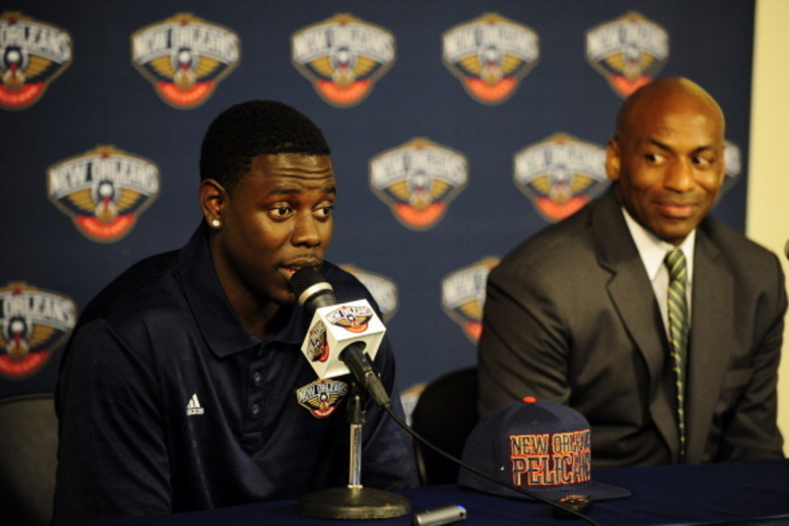 METAIRIE, LA - JULY 12:  Dell Demps, general manager of the New Orleans Pelicans introduces Jrue Holiday, acquired in a trade on July 12, 2013 at the New Orleans Pelicans practice facility in Metairie, Louisiana. NOTE TO USER: User expressly acknowledges 