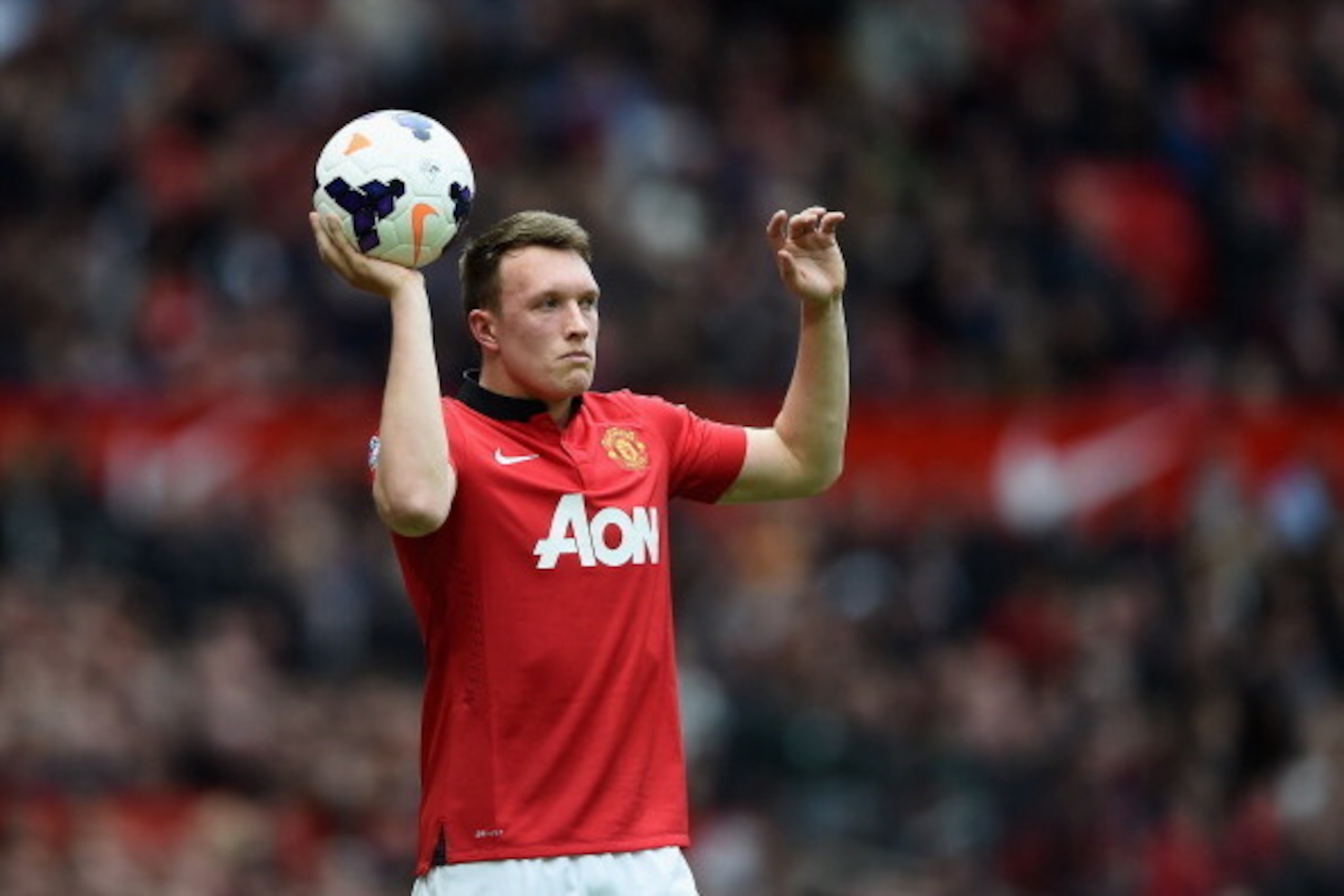 MANCHESTER, ENGLAND - APRIL 26:  Phil Jones of Machester United in action during the Barclays Premier League match between Manchester United and Norwich City at Old Trafford on April 26, 2014 in Manchester, England.  (Photo by Laurence Griffiths/Getty Ima