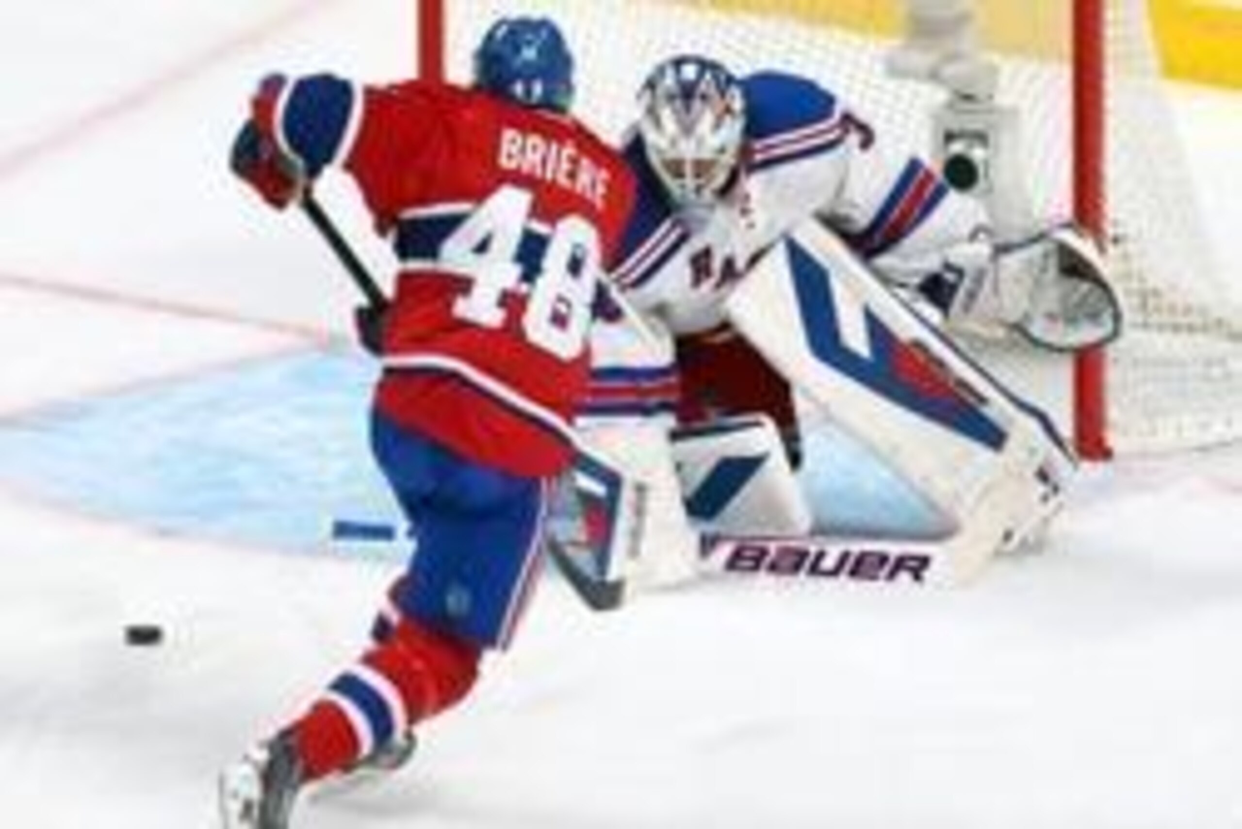 May 17, 2014; Montreal, Quebec, CAN; New York Rangers goalie Henrik Lundqvist (30)  makes a save against Montreal Canadiens center Daniel Briere (48) during the third period in game one of the Eastern Conference Finals of the 2014 Stanley Cup Playoffs at 