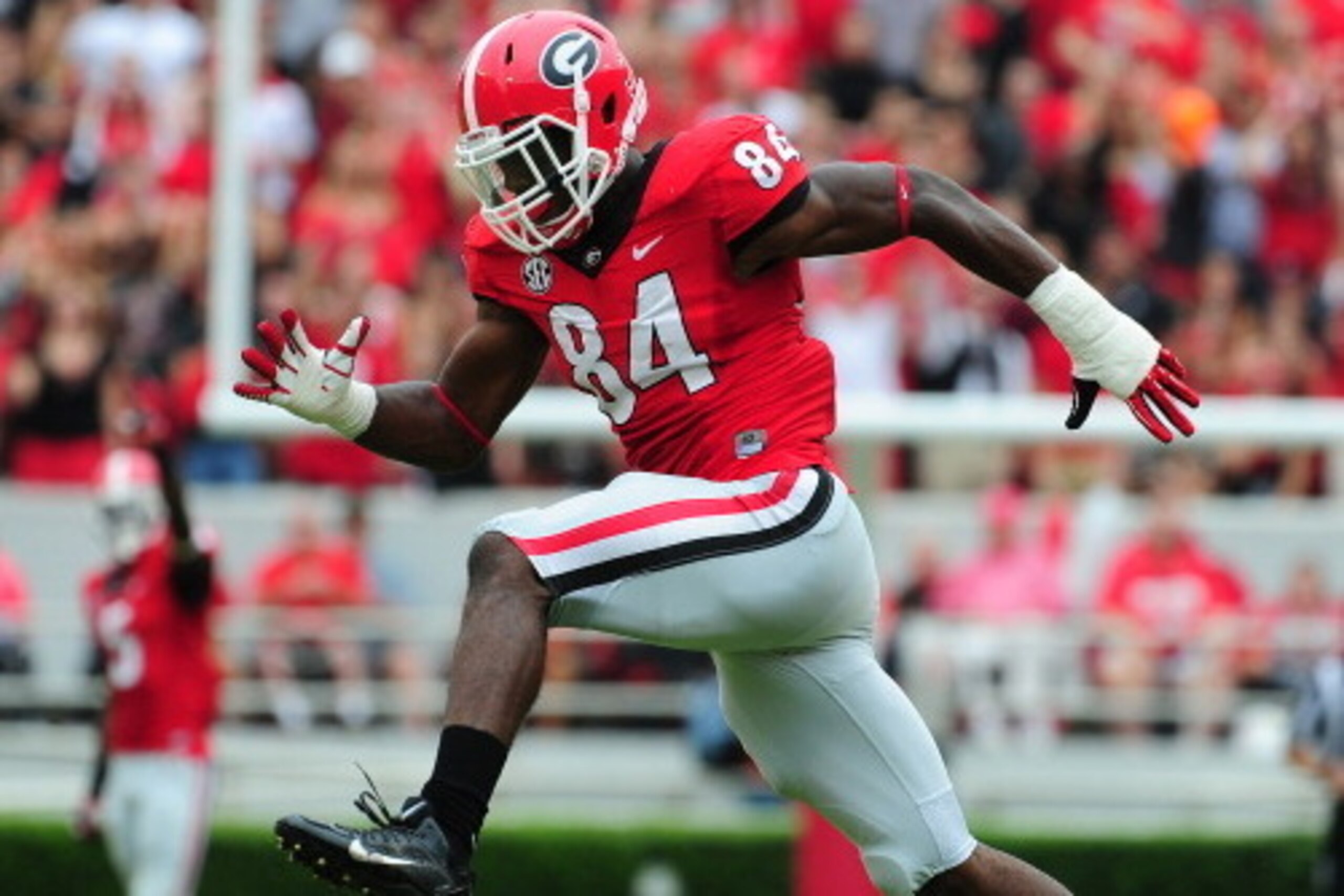 ATHENS, GA - SEPTEMBER 21: Leonard Floyd #84 of the Georgia Bulldogs celebrates after making a tackle against the North Texas Mean Green at Sanford Stadium on September 21, 2013 in Athens, Georgia. (Photo by Scott Cunningham/Getty Images)