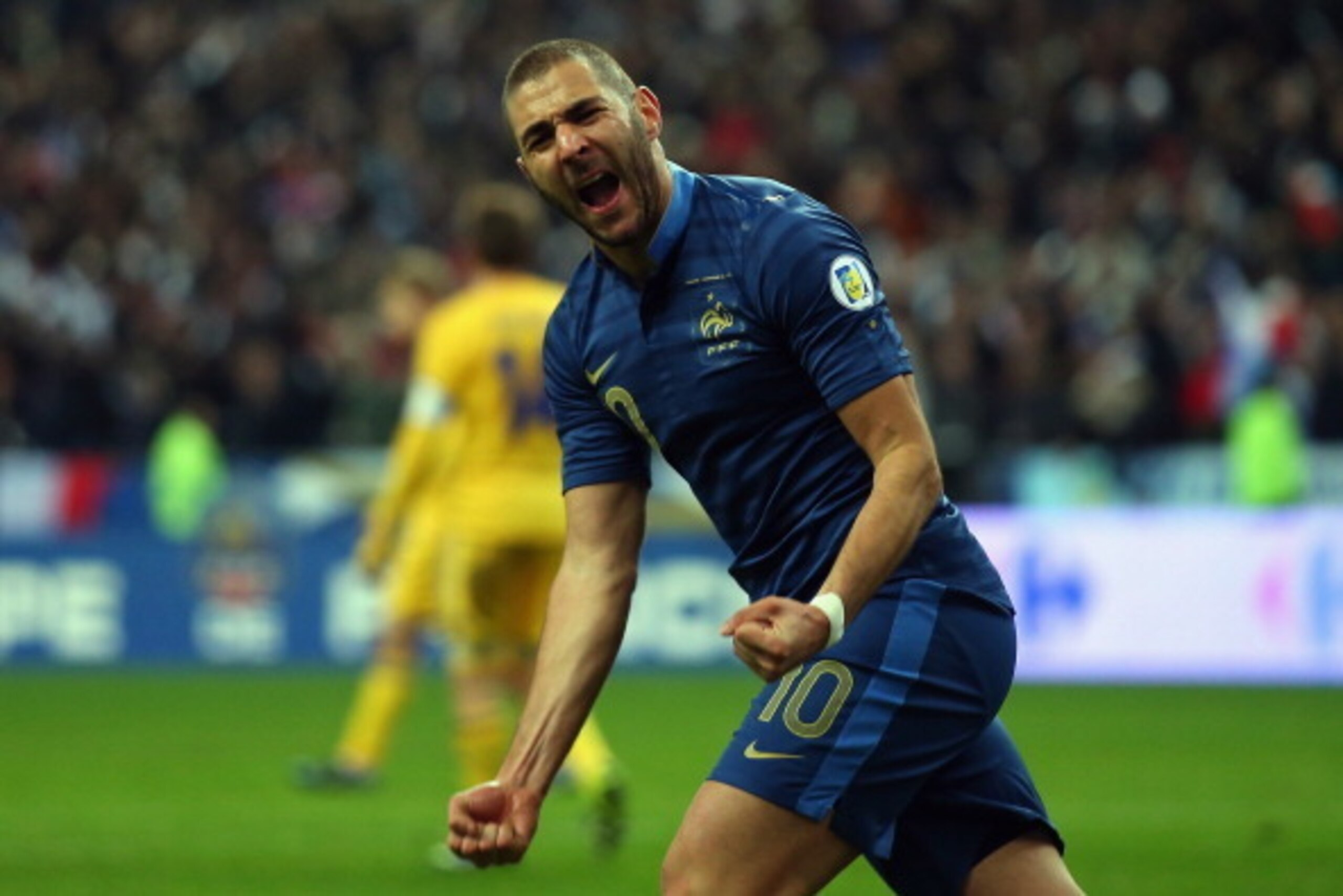 PARIS, FRANCE - NOVEMBER 19:  Karim Benzema of France celebrates scoring during the FIFA 2014 World Cup Qualifier Play-off second leg match between France and Ukraine at the Stade de France on November 19, 2013 in Paris, France.  (Photo by Bryn Lennon/Get