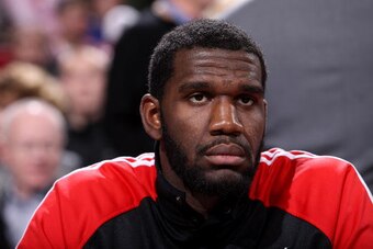 PORTLAND, OR - DECEMBER 01:  Greg Oden #52 of the Portland Trail Blazers watches from the sidelines during the game against the Miami Heat on December 1, 2009 at the Rose Garden in Portland, Oregon.  The Heat won 107-100.  NOTE TO USER: User expressly ack