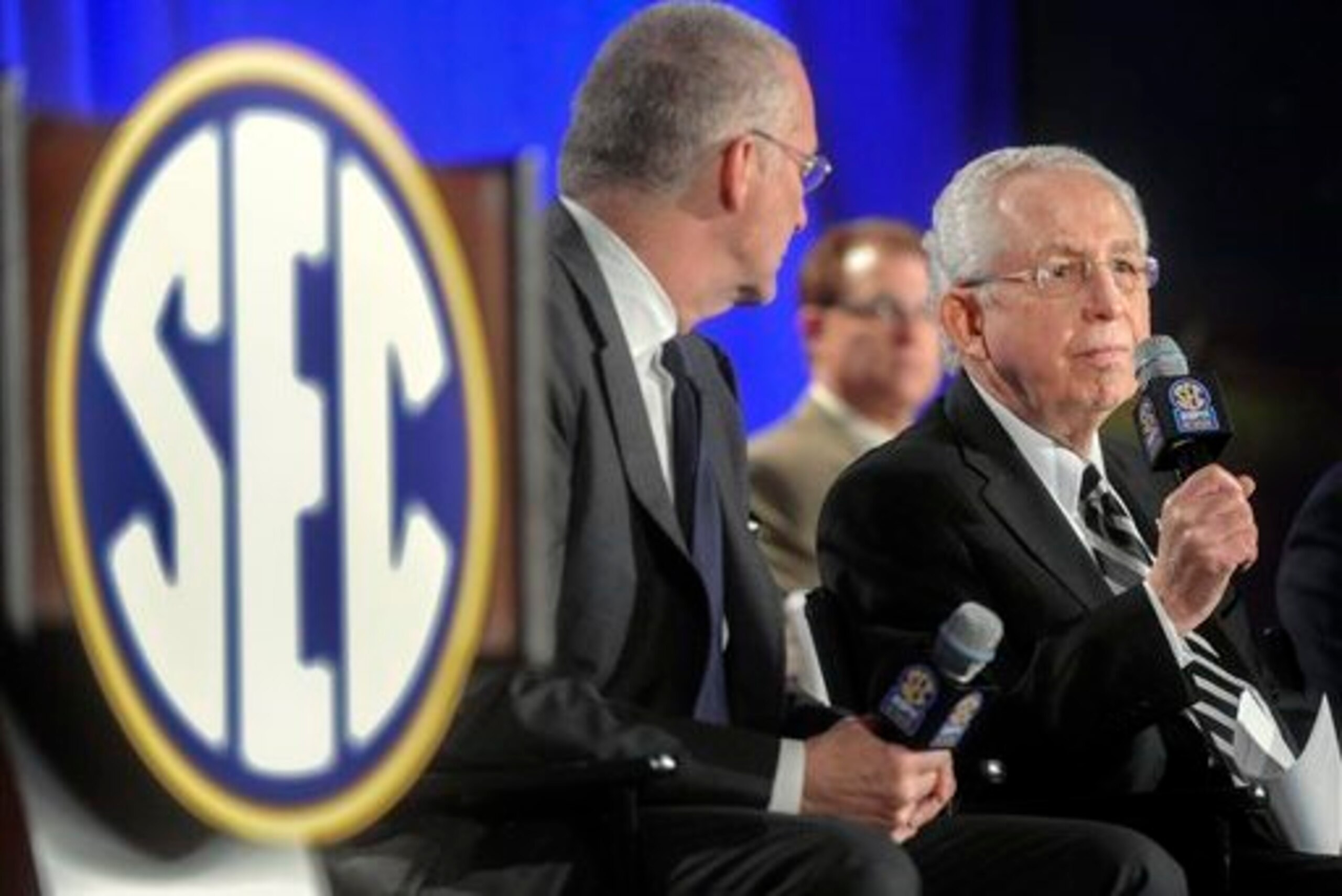SEC commissioner Mike Slive (right)
