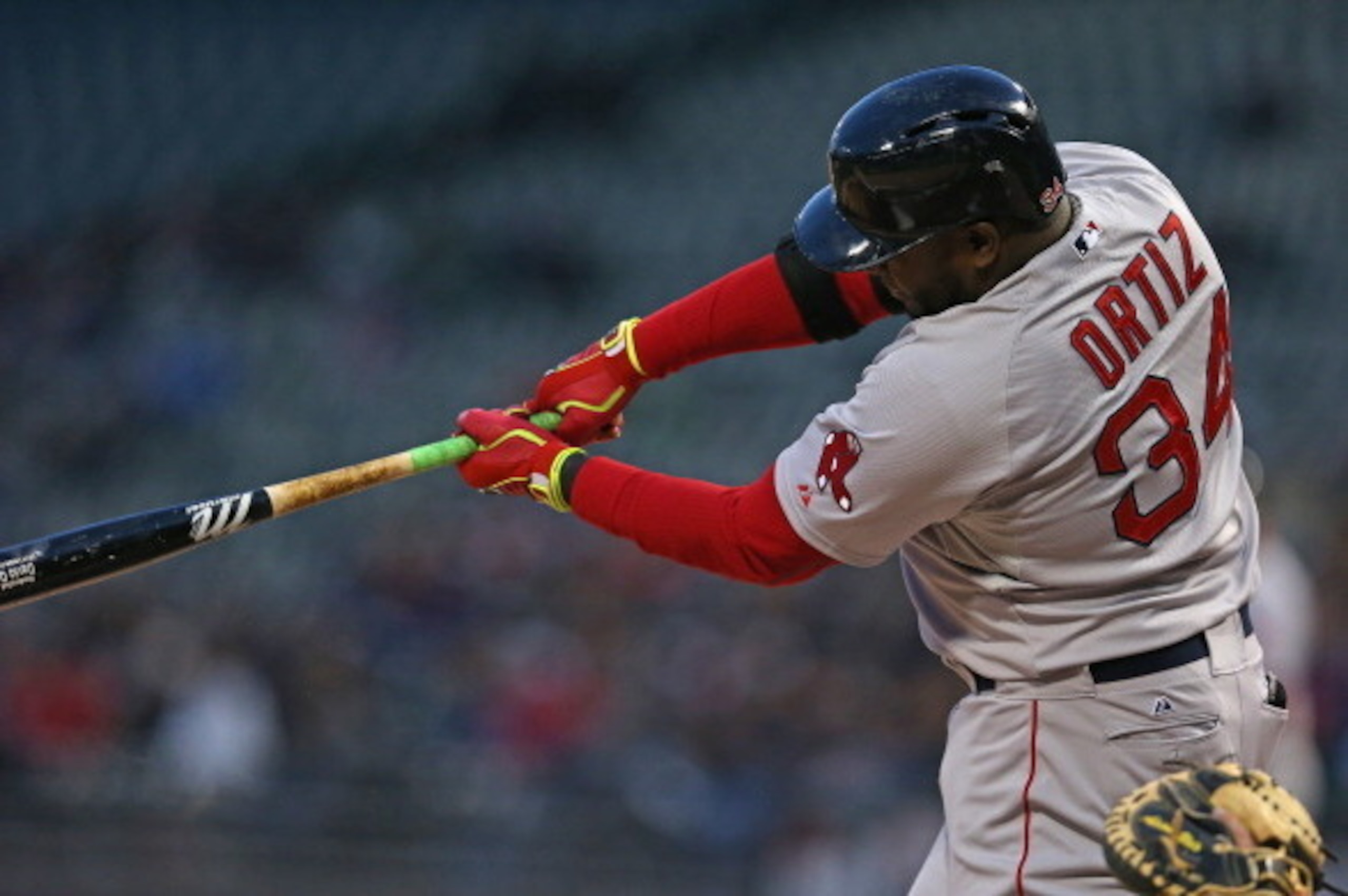 CHICAGO, IL - APRIL 16: David Ortiz #34 of the Boston Red Soxhits a single in the 1st inning against the Chicago White Sox at U.S. Cellular Field on April 16, 2014 in Chicago, Illinois. (Photo by Jonathan Daniel/Getty Images)
