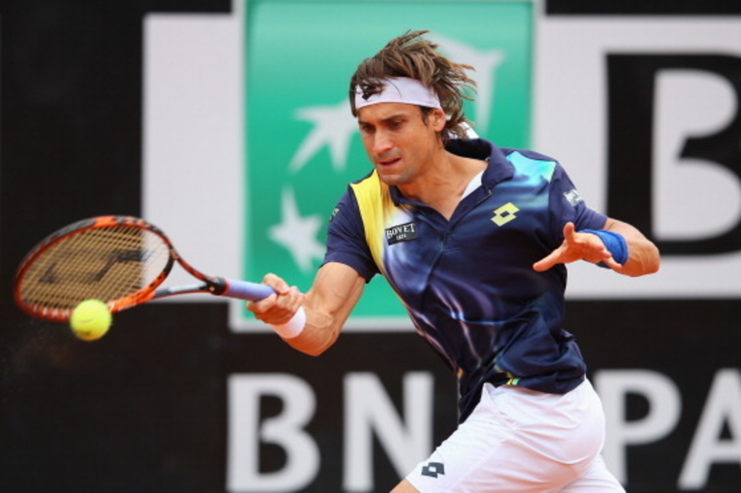ROME, ITALY - MAY 16:  David Ferrer of Spain in action against Novak Djokovic of Serbia during day six of the Internazionali BNL d'Italia tennis 2014 on May 16, 2014 in Rome, Italy.  (Photo by Julian Finney/Getty Images)