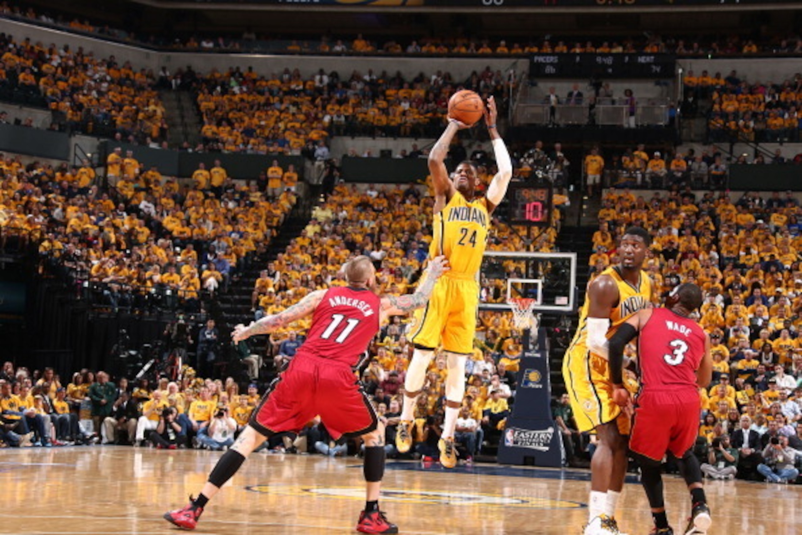 INDIANAPOLIS - MAY 18: Paul George #24 of the Indiana Pacers shoots the ball against the Miami Heat in game one of the East Conference Finals at Bankers Life Fieldhouse on May 18, 2014 in Indianapolis, Indiana.  NOTE TO USER: User expressly acknowledges a