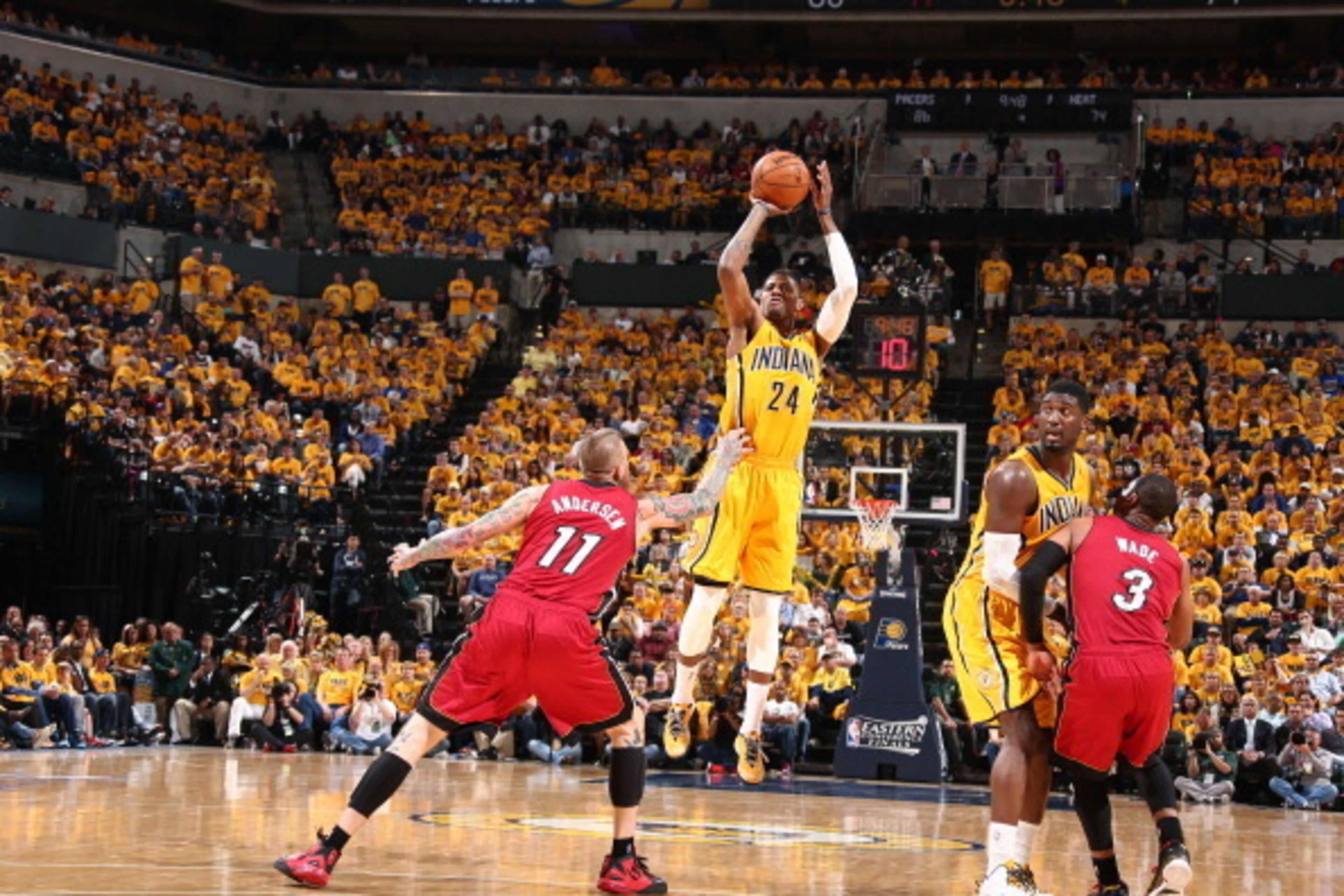 INDIANAPOLIS - MAY 18: Paul George #24 of the Indiana Pacers shoots the ball against the Miami Heat in game one of the East Conference Finals at Bankers Life Fieldhouse on May 18, 2014 in Indianapolis, Indiana. NOTE TO USER: User expressly acknowledges a INDIANAPOLIS - MAY 18: Paul George #24 of the Indiana Pacers shoots the ball against the Miami Heat in game one of the East Conference Finals at Bankers Life Fieldhouse on May 18, 2014 in Indianapolis, Indiana. NOTE TO USER: User expressly acknowledges a
