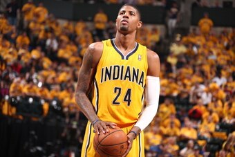 INDIANAPOLIS - MAY 18: Paul George #24 of the Indiana Pacers shoots a foul shot against the Miami Heat in game one of the East Conference Finals at Bankers Life Fieldhouse on May 18, 2014 in Indianapolis, Indiana.  NOTE TO USER: User expressly acknowledge