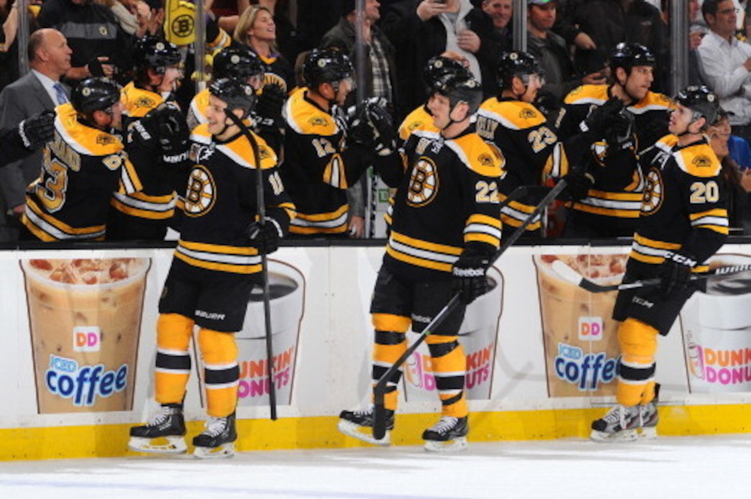 BOSTON, MA - NOVEMBER 21: Gregory Campbell #11, Shawn Thornton #22 and Danel Paille #20 of the Boston Bruins celebrate a goal against the St. Louis Blues at the TD Garden on November 21, 2013 in Boston, Massachusetts.  (Photo by Steve Babineau/NHLI via Ge