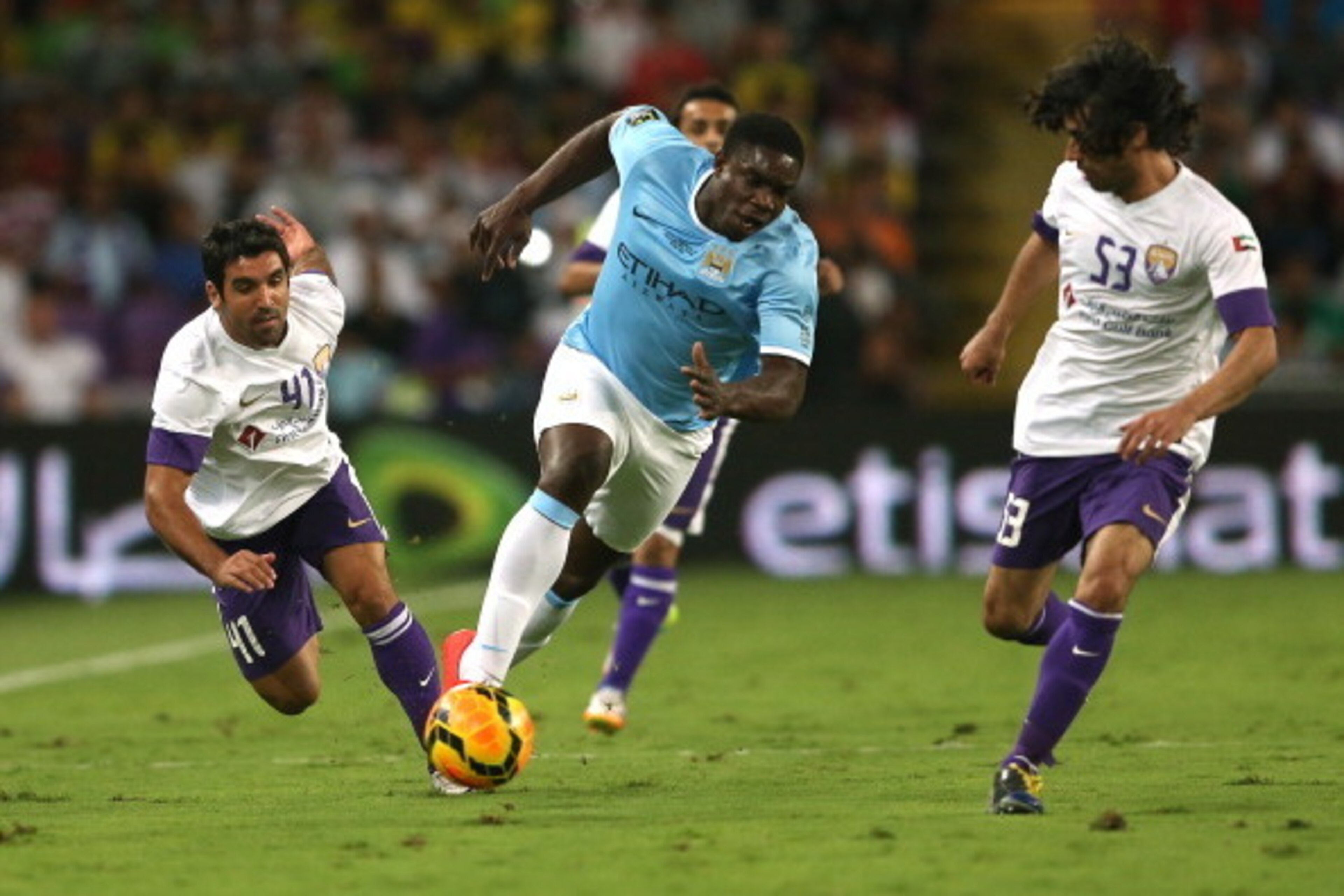 AL AIN, UNITED ARAB EMIRATES - MAY 15:  Micah Richards of Manchester City in action  during the friendly match between Al Ain and Manchester City at Hazza bin Zayed Stadium on May 15, 2014 in Al Ain, United Arab Emirates.  (Photo by Warren Little/Getty Im
