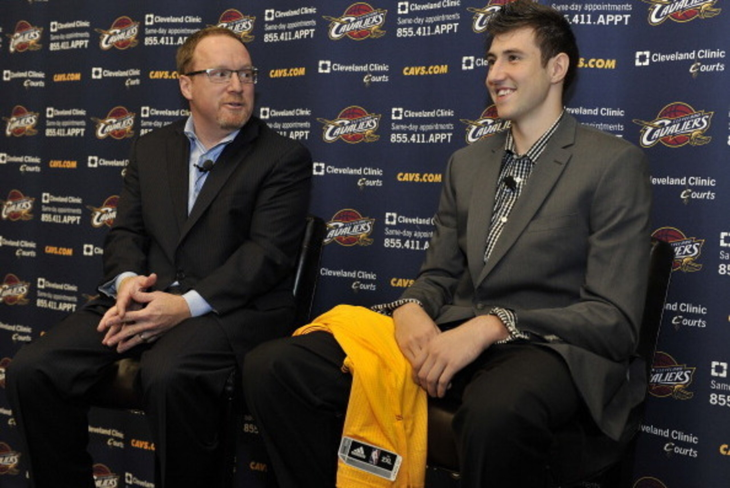 INDEPENDENCE, OH - JULY 23:  First round draft pick Sergey Karasev of the Cleveland Cavaliers is introduced to the media to the alongside Vice President of Basketball Operations David Griffin at The Cleveland Clinic Courts on July 23, 2013 in Independence