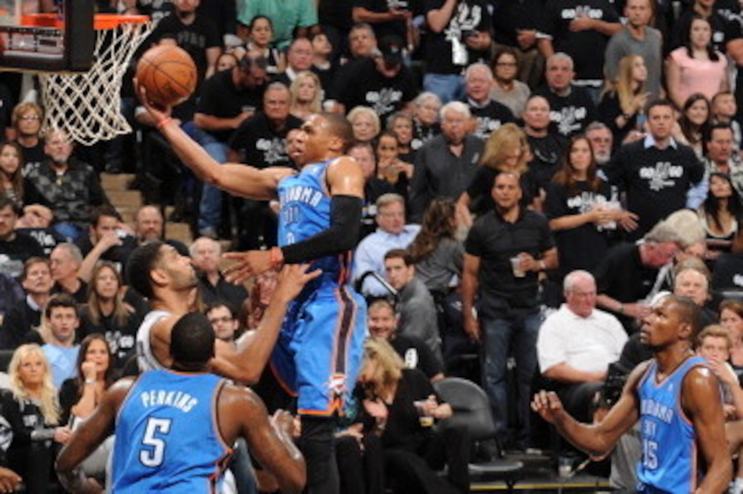 SAN ANTONIO, TX - MAY 19: Russell Westbrook #0 of the Oklahoma City Thunder goes up for the layup against the San Antonio Spurs during Game One of the Western Conference Finals during the 2014 NBA Playoffs on May 19, 2014 at the AT&T Center in San Antonio