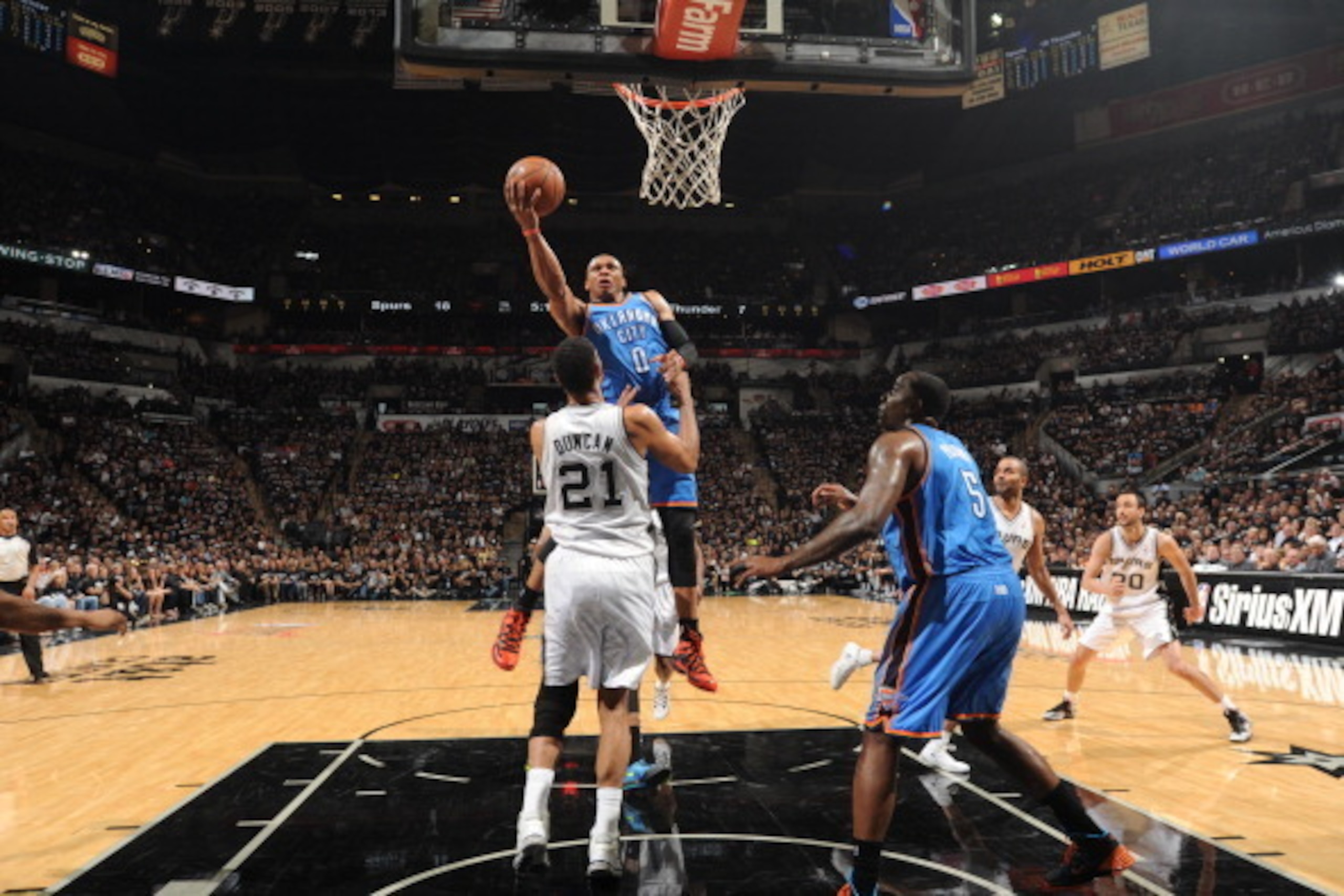SAN ANTONIO, TX - MAY 19: Russell Westbrook #0 of the Oklahoma City Thunder goes up for the layup against the San Antonio Spurs during Game One of the Western Conference Finals during the 2014 NBA Playoffs on May 19, 2014 at the AT&T Center in San Antonio