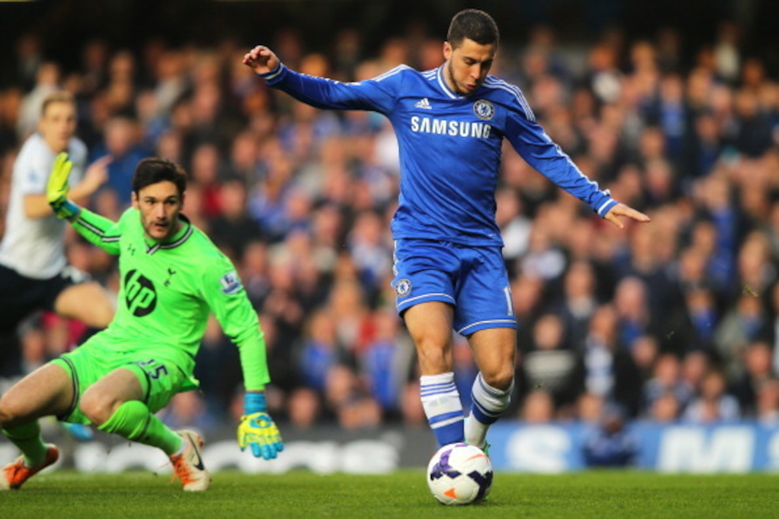 LONDON, ENGLAND - MARCH 08:  Eden Hazard of Chelsea rounds goalkeeper Hugo Lloris of Spurs, but puts his shot wide of the open goal during the Barclays Premier League match between Chelsea and Tottenham Hotspur at Stamford Bridge on March 8, 2014 in Londo