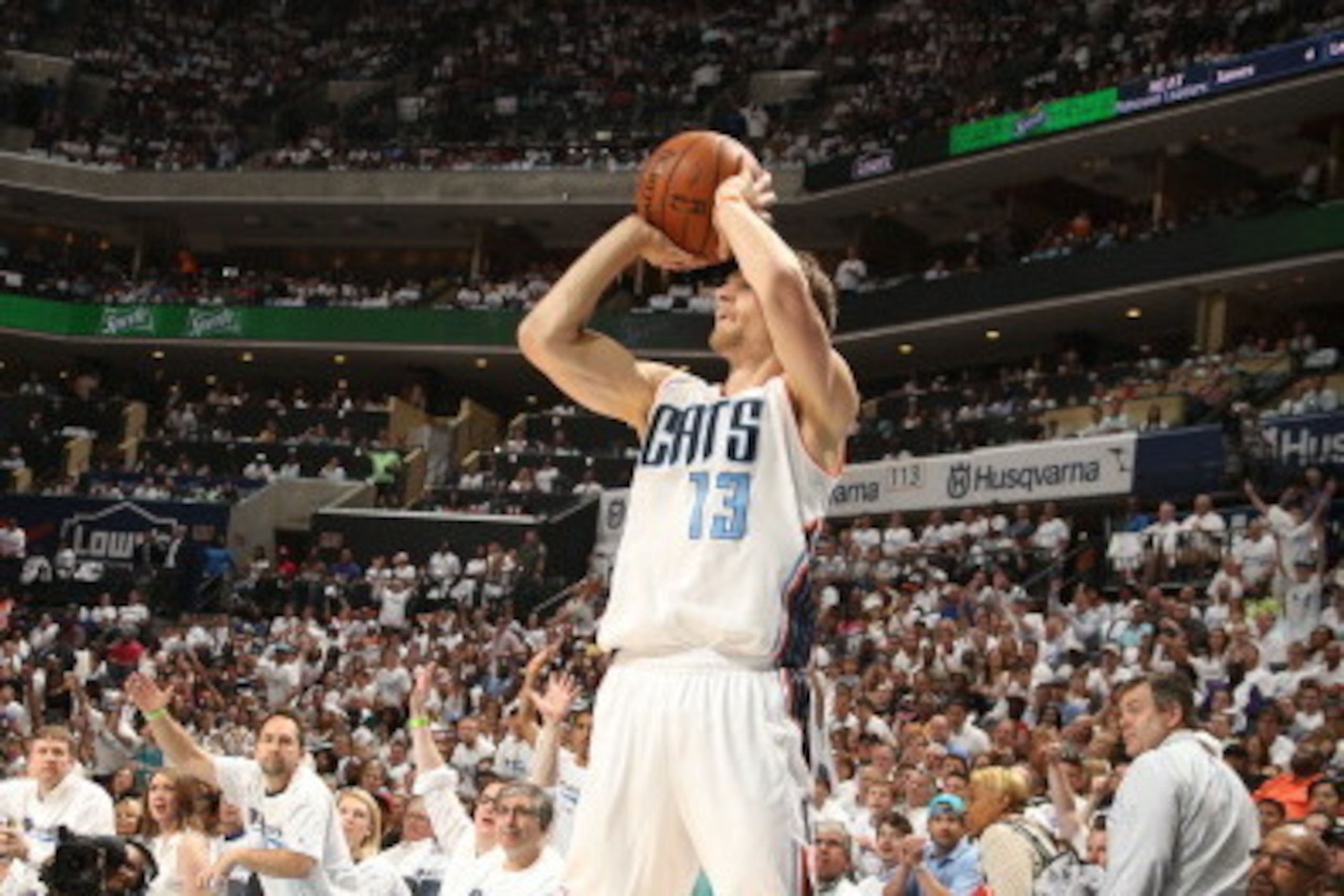 CHARLOTTE, NC - APRIL 26: Luke Ridnour #13 of the Charlotte Bobcats shoots against the Miami Heat during Game Three of the Eastern Conference Quarterfinals of the 2014 NBA playoffs at the Time Warner Cable Arena on April 26, 2014 in Charlotte, North Carol