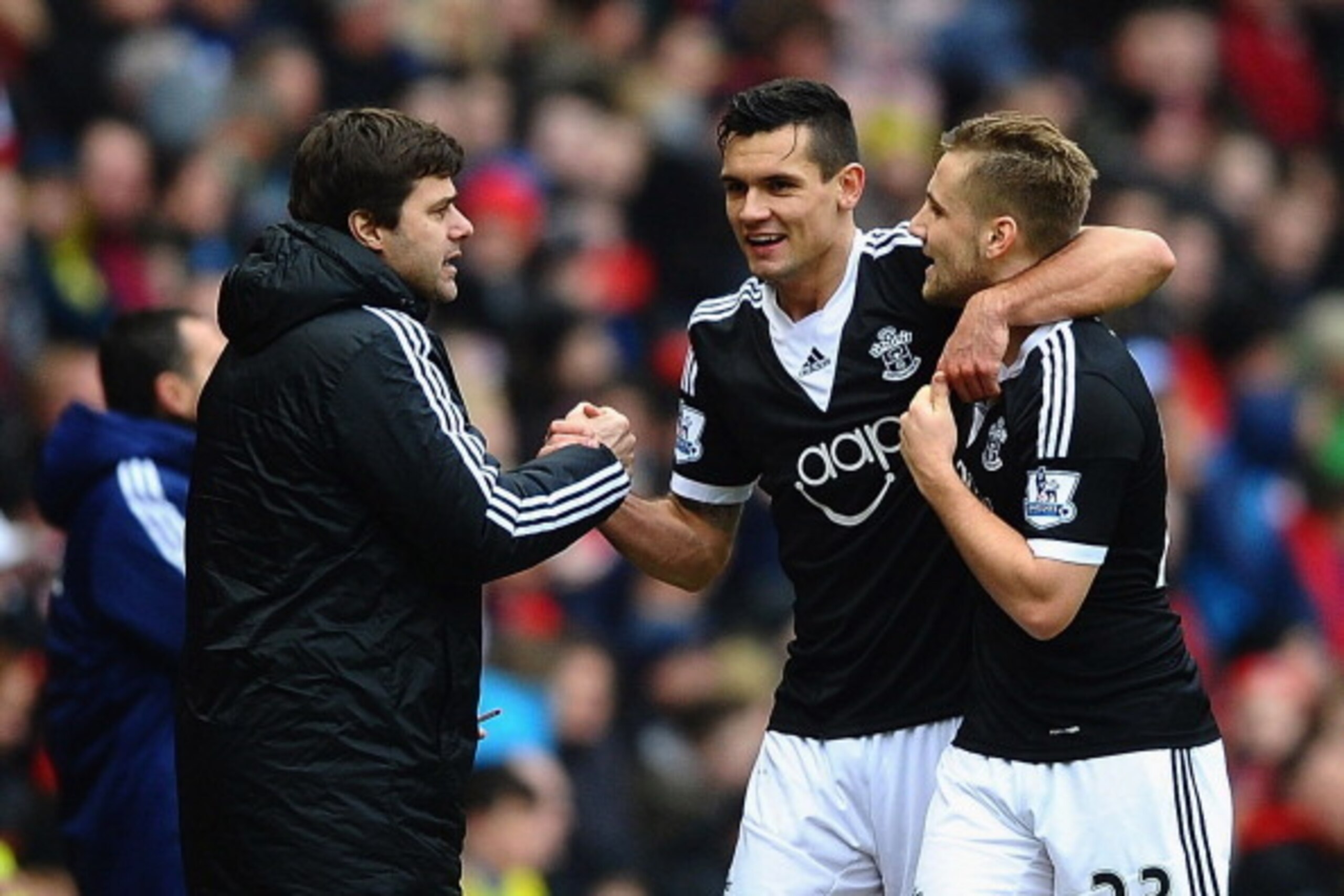 SUNDERLAND, ENGLAND - JANUARY 18: Dejan Lovren of Southampton (C) celebrates with Mauricio Pochettino manager of Southampton (L) and Luke Shaw (23) as he scores their second goal during the Barclays Premier League match between Sunderland and Southampton SUNDERLAND, ENGLAND - JANUARY 18: Dejan Lovren of Southampton (C) celebrates with Mauricio Pochettino manager of Southampton (L) and Luke Shaw (23) as he scores their second goal during the Barclays Premier League match between Sunderland and Southampton