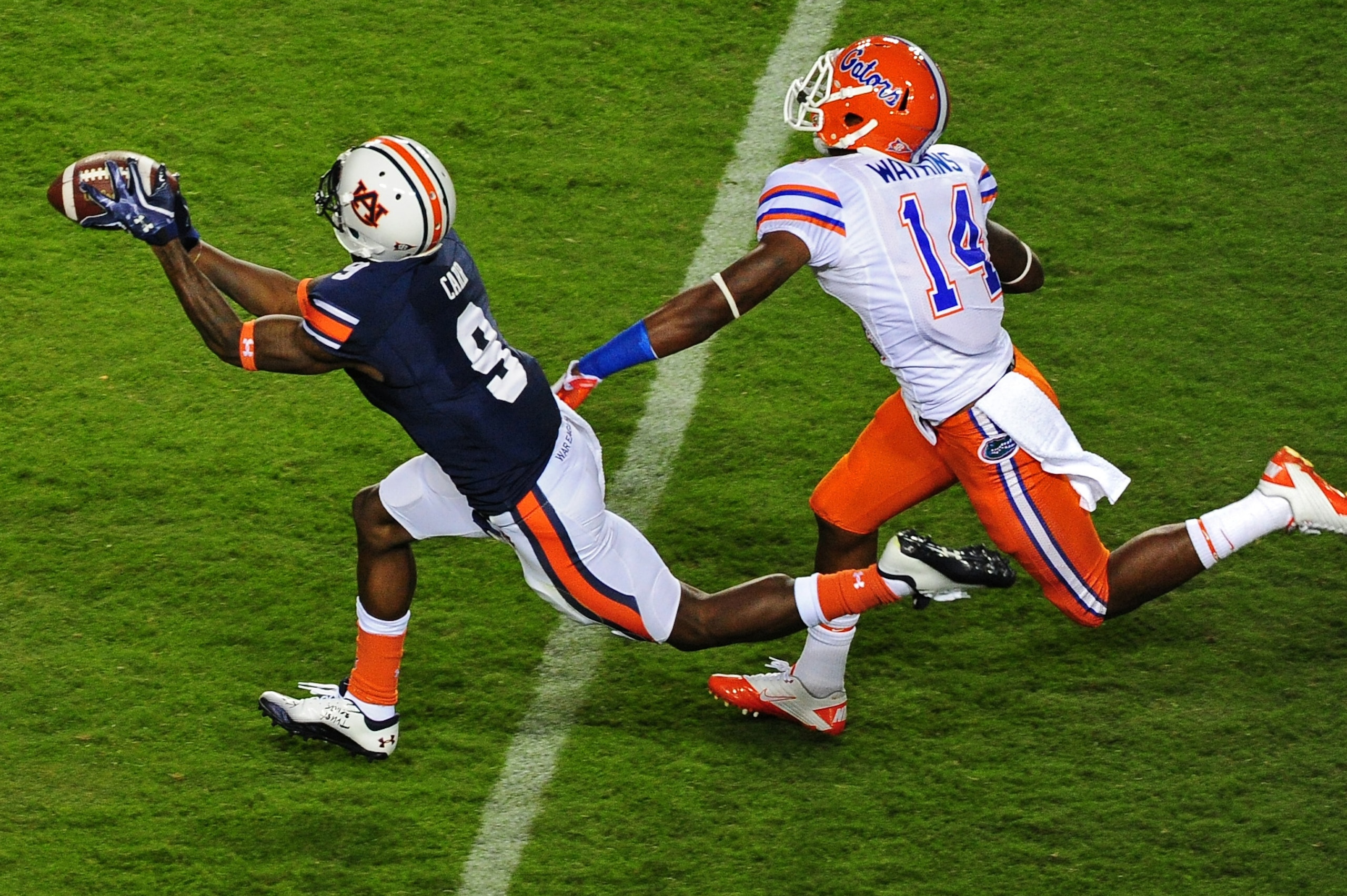 AUBURN, AL - OCTOBER 15: Quindarius Carr #9 of the Auburn Tigers makes a catch against Jaylen Watkins #14 of the Florida Gators at Jordan-Hare Stadium on October 15, 2011 in Auburn, Alabama. Photo by Scott Cunningham/Getty Images)