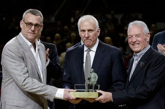 With GM RC Buford (far left) and owner Peter Holt (far right), Gregg Popovich has built a franchise many NBA teams have tried to emulate.