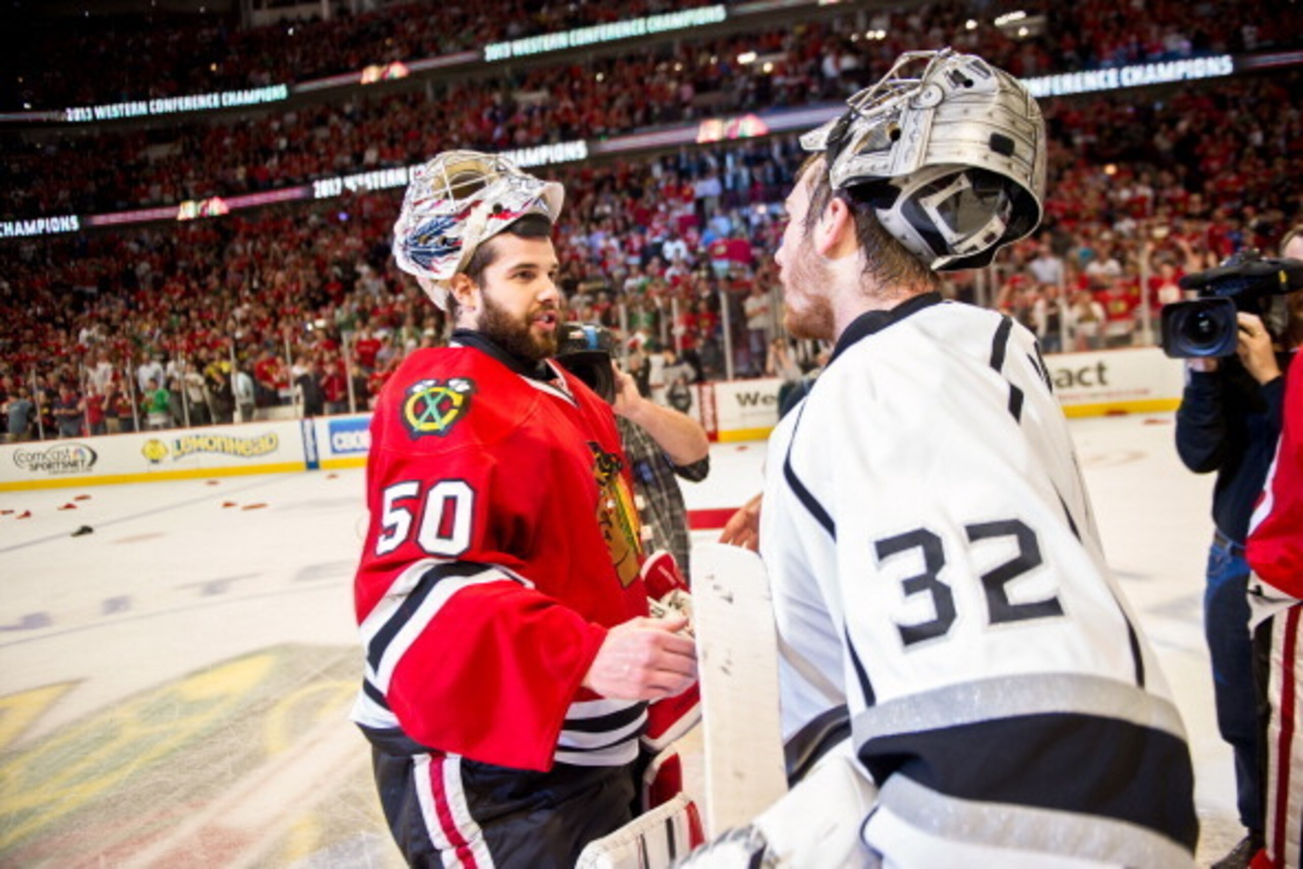 CHICAGO, IL - JUNE 8: Goalie Corey Crawford #50 of the Chicago Blackhawks and goalie Jonathan Quick #32 of the Los Angeles Kings shake hands after the Blackhawks defeated the Kings to become the 2013 Western Conference Champions in Game Five of the Wester