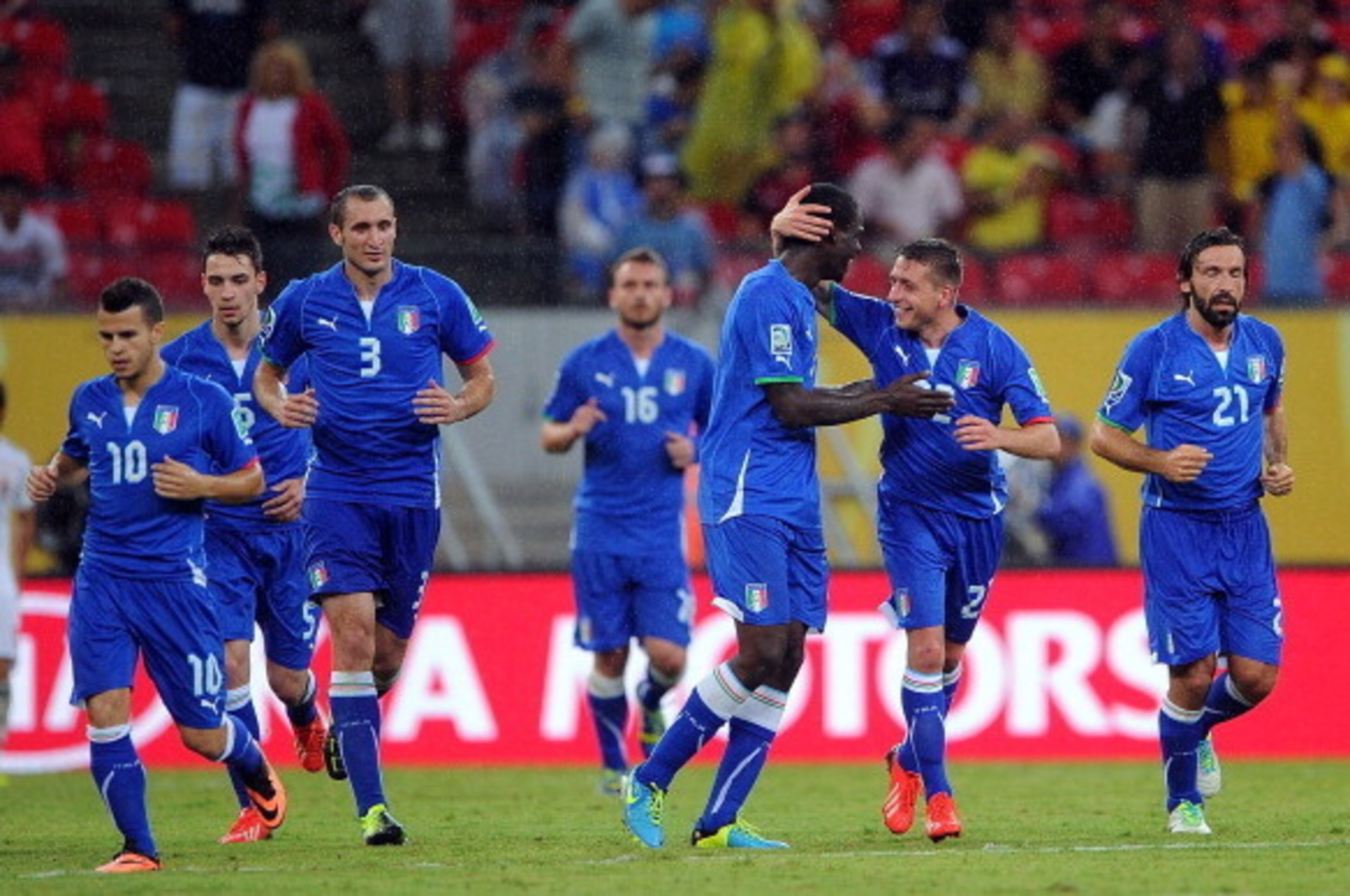 RECIFE, BRAZIL - JUNE 19:  Mario Balotelli of Italy celebrates with his team-mates after scoring his team's third goal during the FIFA Confederations Cup Brazil 2013 Group A match between Italy and Japan at Arena Pernambuco on June 19, 2013 in Recife, Bra