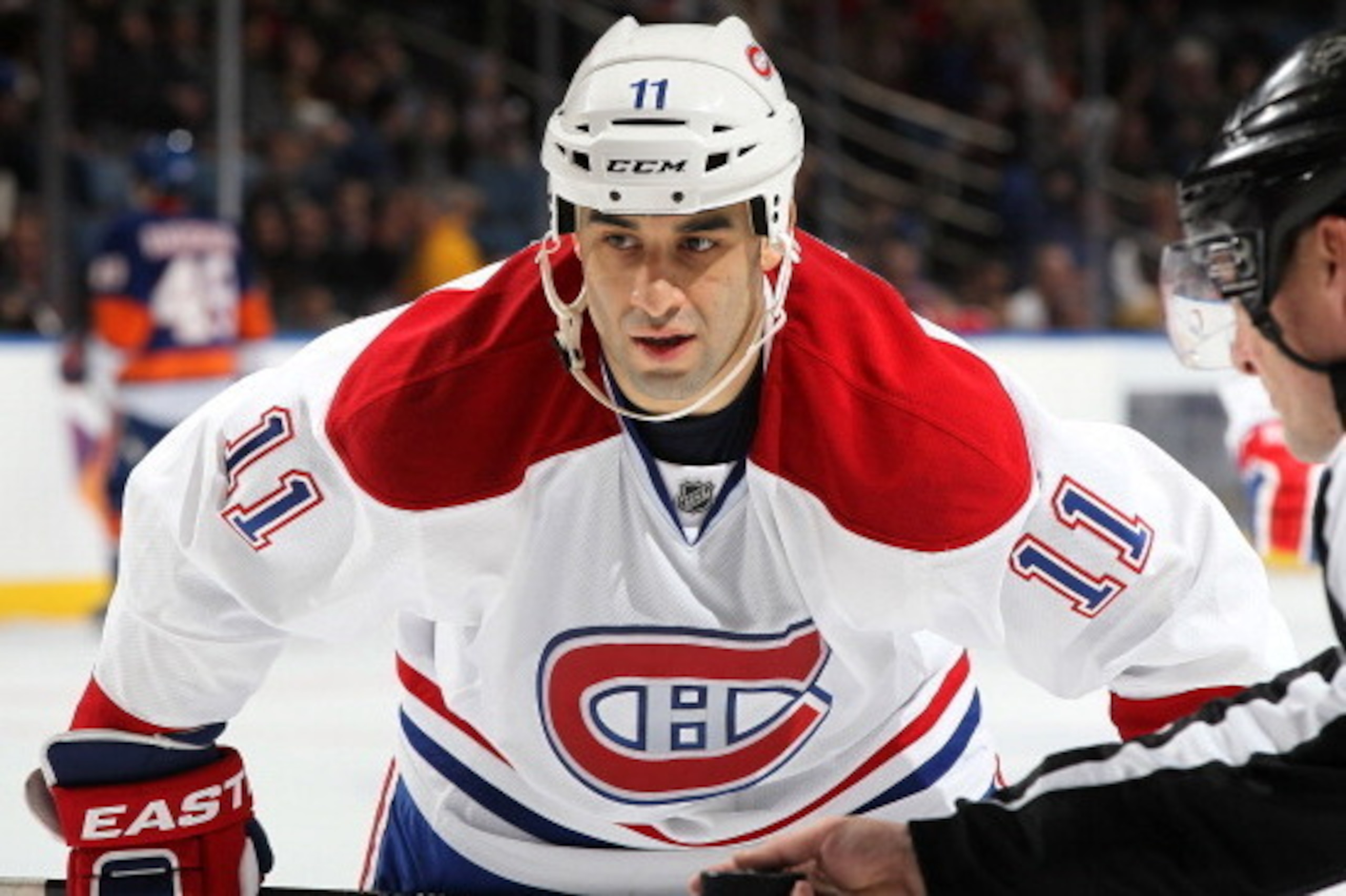UNIONDALE, NY - FEBRUARY 09: Scott Gomez #11 of the Montreal Canadiens skates against the New York Islanders at Nassau Veterans Memorial Coliseum on February 9, 2012 in Uniondale, New York. The Canadiens defeated the Islanders 4-2.  (Photo by Mike Stobe/N