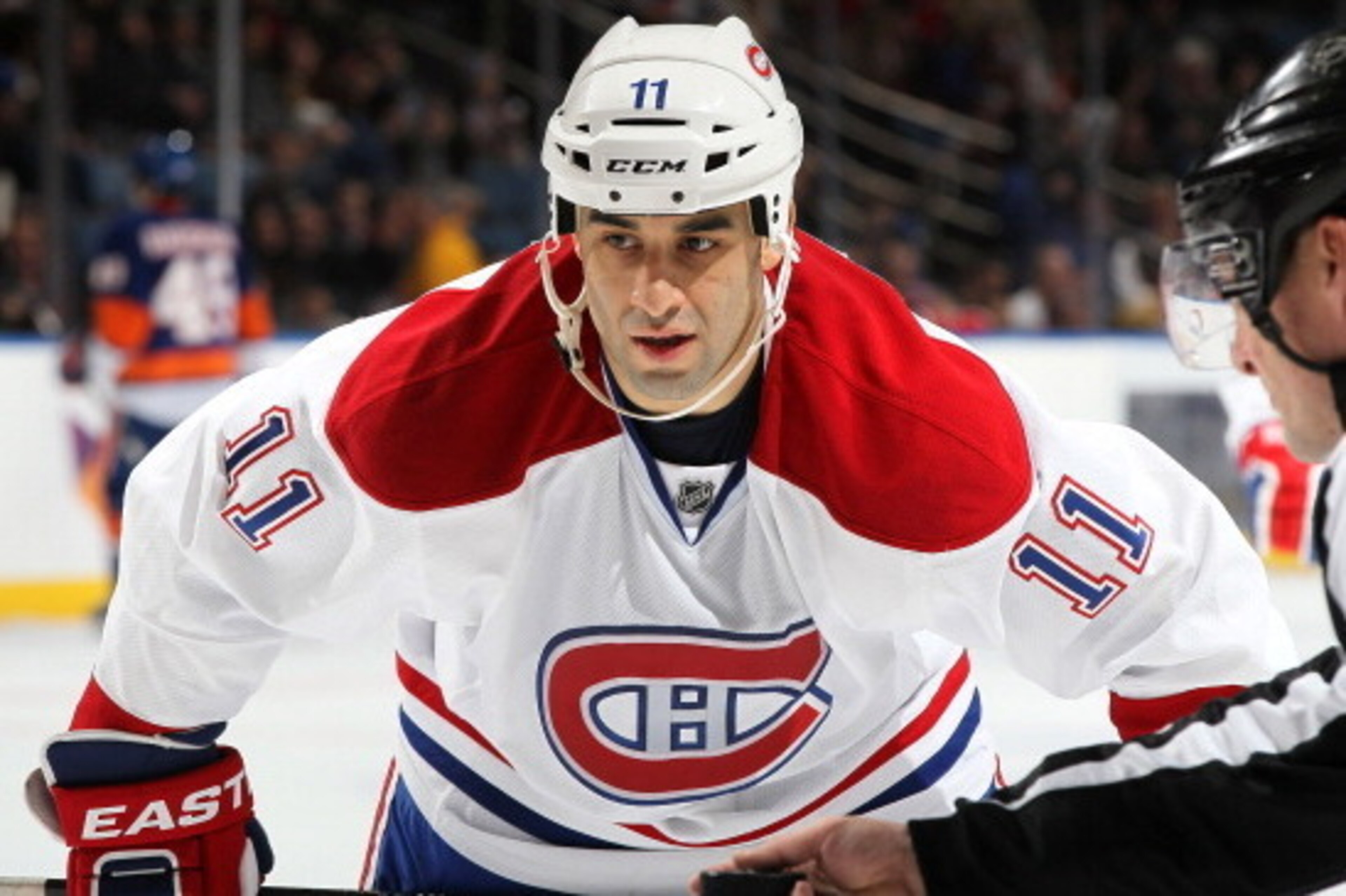 UNIONDALE, NY - FEBRUARY 09: Scott Gomez #11 of the Montreal Canadiens skates against the New York Islanders at Nassau Veterans Memorial Coliseum on February 9, 2012 in Uniondale, New York. The Canadiens defeated the Islanders 4-2.  (Photo by Mike Stobe/N