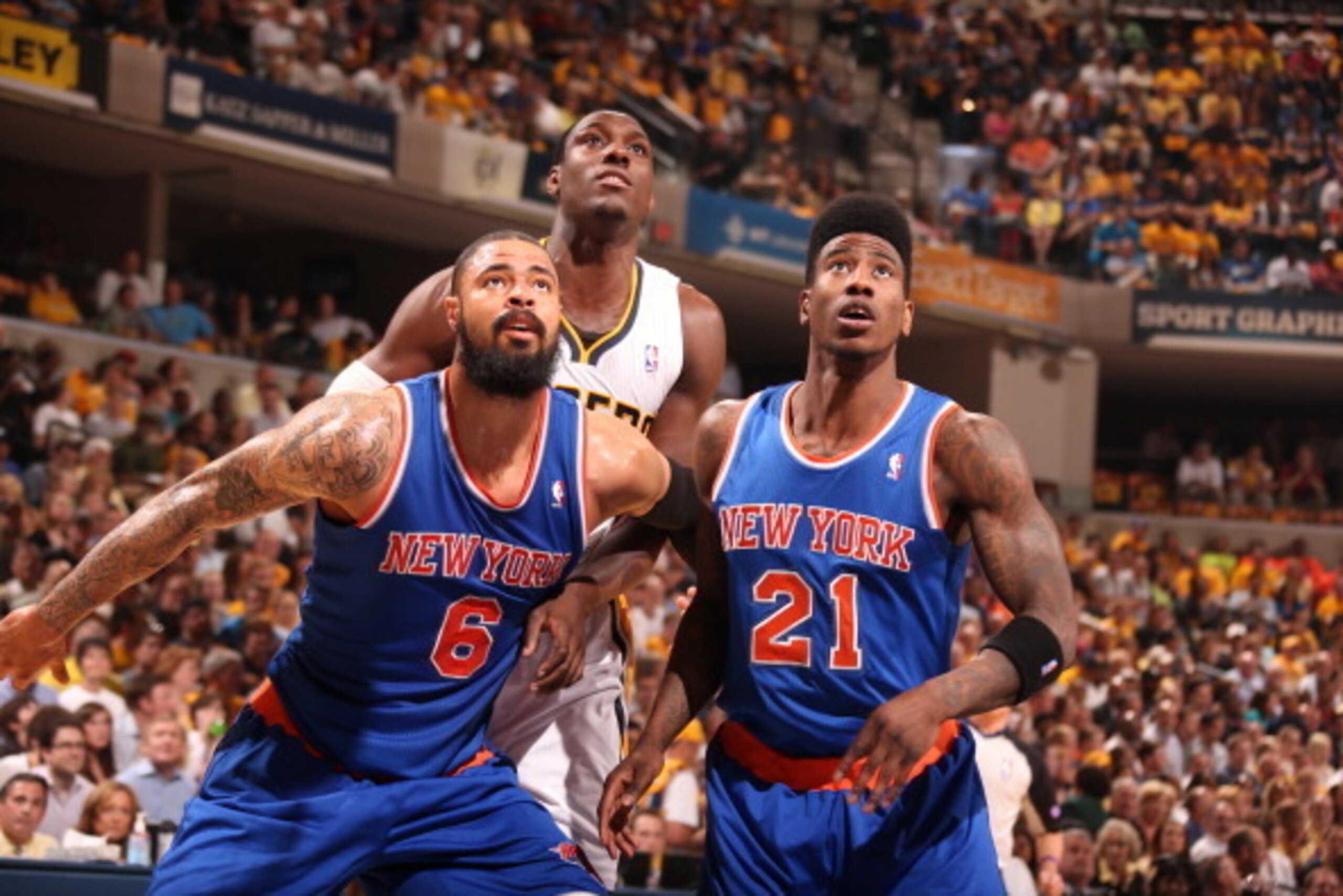INDIANAPOLIS, IN - MAY 14:  Tyson Chandler #6 and Iman Shumpert #21 of the New York Knicks box out Ian Mahinmi #28 of the Indiana Pacers in Game Four of the Eastern Conference Semifinals during the 2013 NBA Playoffs on May 14, 2013 at Bankers Life Fieldho