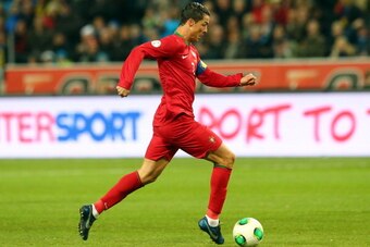 STOCKHOLM, SWEDEN - NOVEMBER 19:  Cristiano Ronaldo of Portugal runs with the ball during the FIFA 2014 World Cup Qualifier Play-off Second Leg match between Sweden and Portugal at Friends Arena on November 19, 2013 in Stockholm, Sweden.  (Photo by Martin