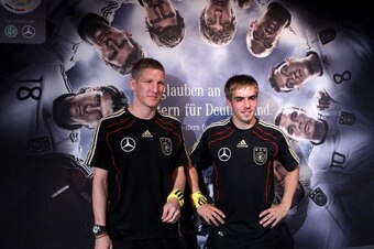 PRETORIA, SOUTH AFRICA - JUNE 11:  Philipp Lahm (R) and Bastian Schweinsteiger of Germany are pictured after the press conference in the media center at Velmore Grande Hotel on June 11, 2010 in Pretoria, South Africa.  (Photo by Joern Pollex/Getty Images)