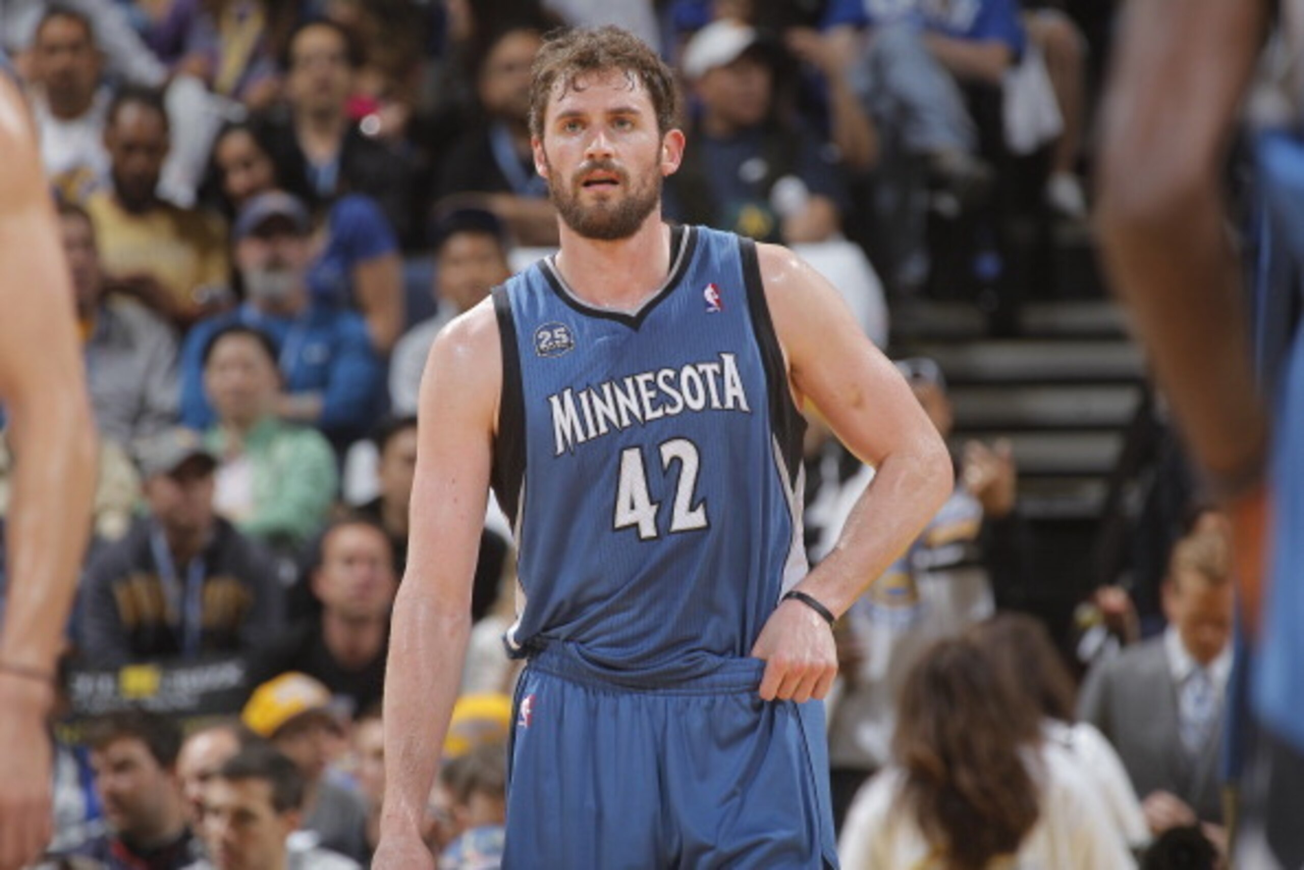 OAKLAND, CA - APRIL 14: Kevin Love #42 of the Minnesota Timberwolves during a game against the Golden State Warriors on April 14, 2014 at Oracle Arena in Oakland, California. NOTE TO USER: User expressly acknowledges and agrees that, by downloading and or OAKLAND, CA - APRIL 14: Kevin Love #42 of the Minnesota Timberwolves during a game against the Golden State Warriors on April 14, 2014 at Oracle Arena in Oakland, California. NOTE TO USER: User expressly acknowledges and agrees that, by downloading and or