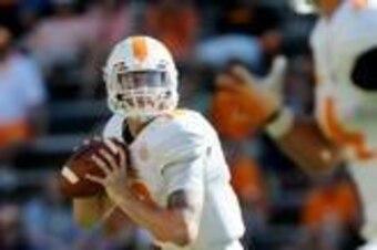 Apr 12, 2014; Knoxville, TN, USA; Tennessee Volunteers quarterback Riley Ferguson (10) looks to throw the ball during the spring game at Neyland Stadium. Mandatory Credit: Randy Sartin-USA TODAY Sports