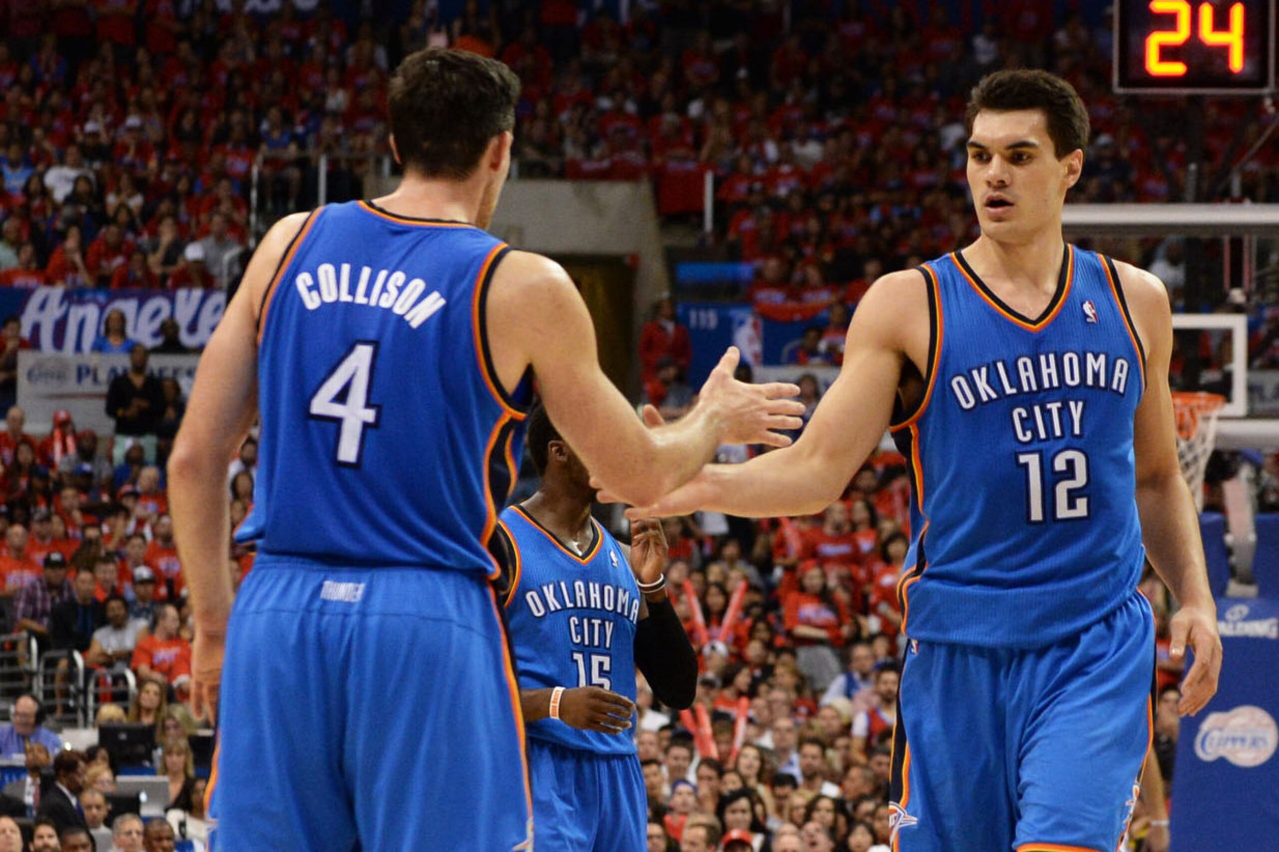 LOS ANGELES, CA - MAY 15: Nick Collison #4 and Steven Adams #12 of the Oklahoma City Thunder celebrate against the Los Angeles Clippers in Game Six of the Western Conference Semifinals during the 2014 NBA Playoffs at Staples Center on May 15, 2014 in Los