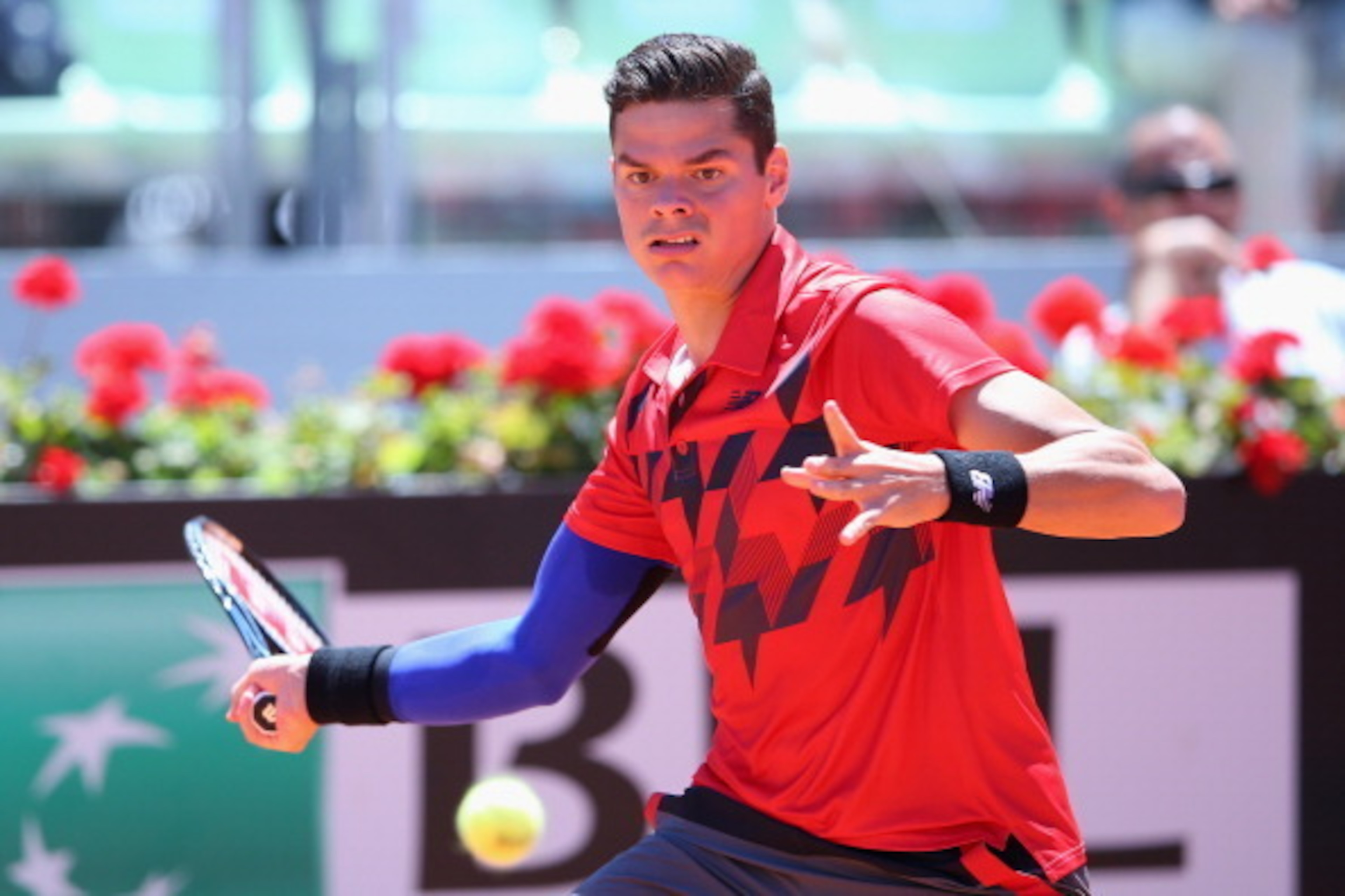 ROME, ITALY - MAY 15:  Milos Raonic of Canada plays a forehand in his match against Jo-Wilfried Tsonga of France during day five of the Internazionali BNL d'Italia tennis 2014 on May 15, 2014 in Rome, Italy.  (Photo by Julian Finney/Getty Images)